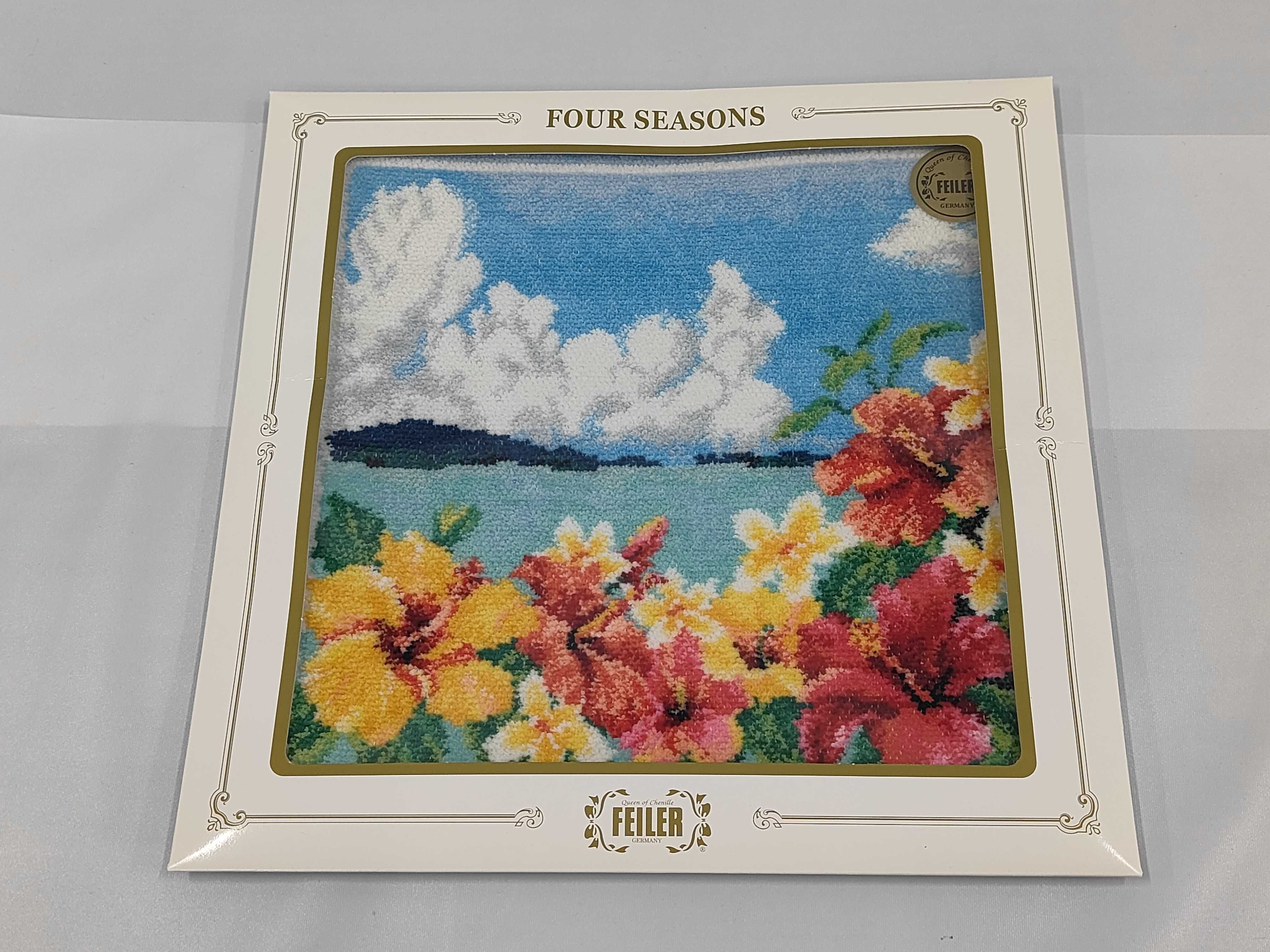 A Set of Four Feiler Germany Four Seasons Series Framed Chenille Textiles