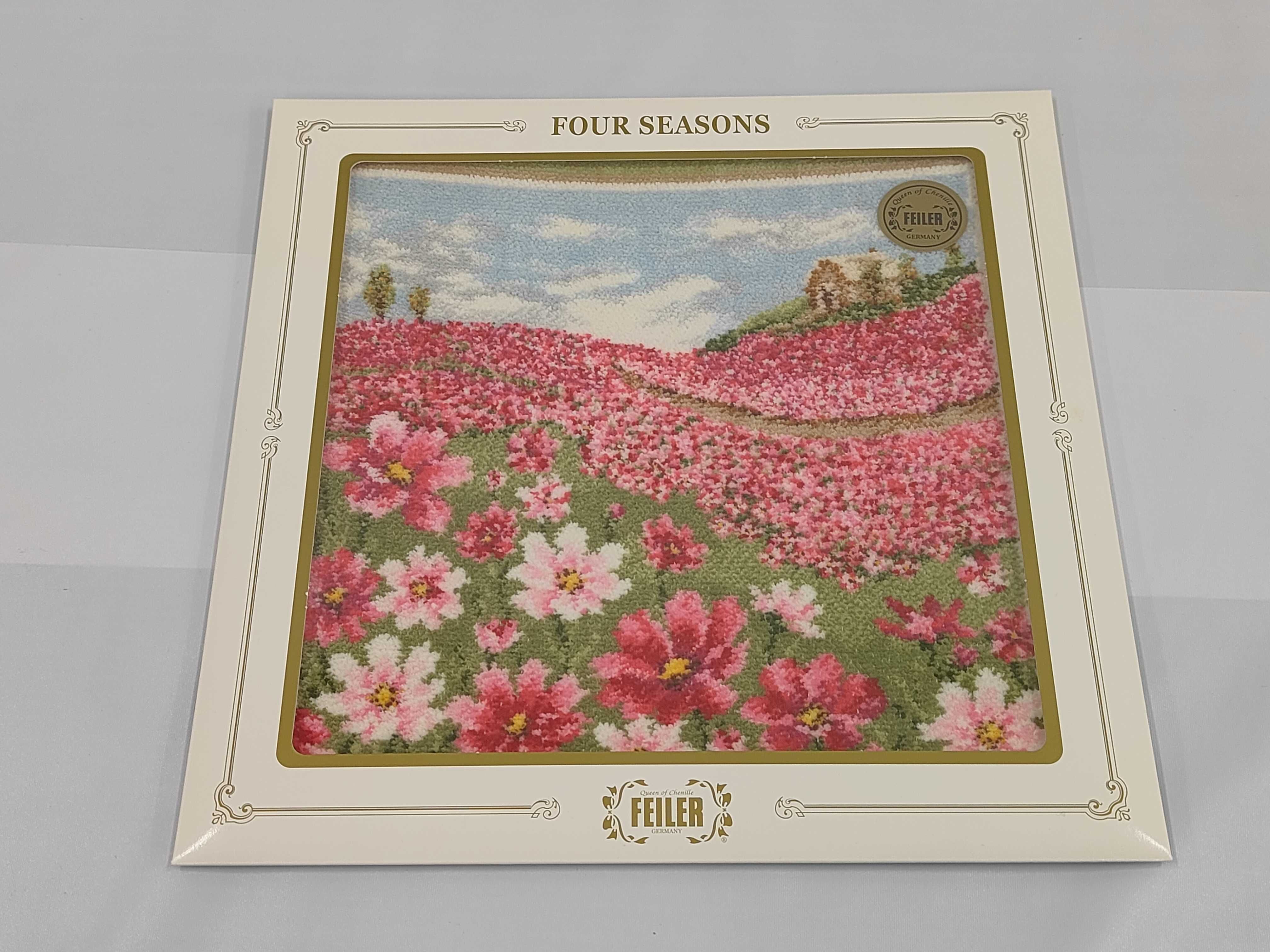 A Set of Four Feiler Germany Four Seasons Series Framed Chenille Textiles
