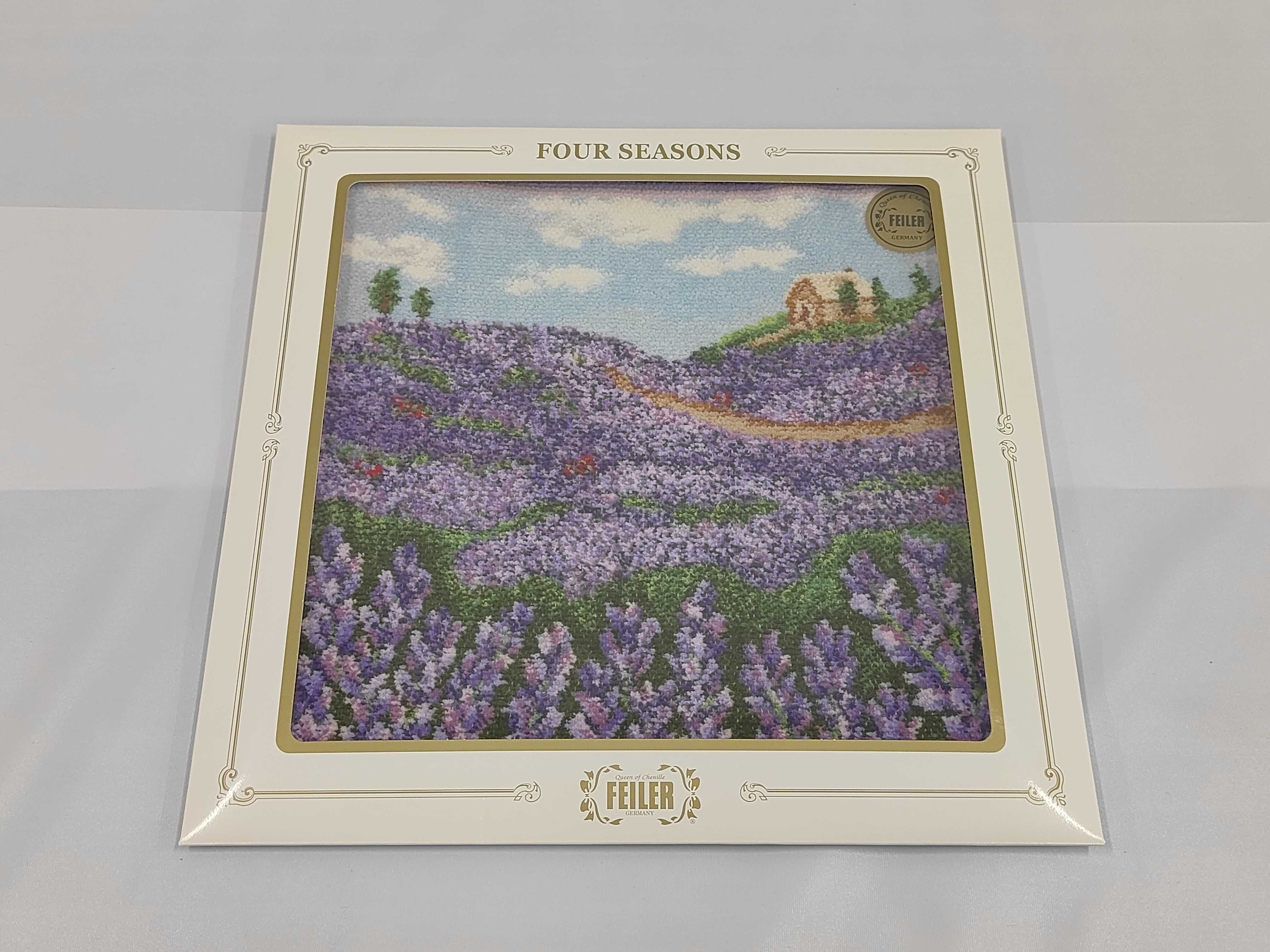 A Set of Four Feiler Germany Four Seasons Series Framed Chenille Textiles