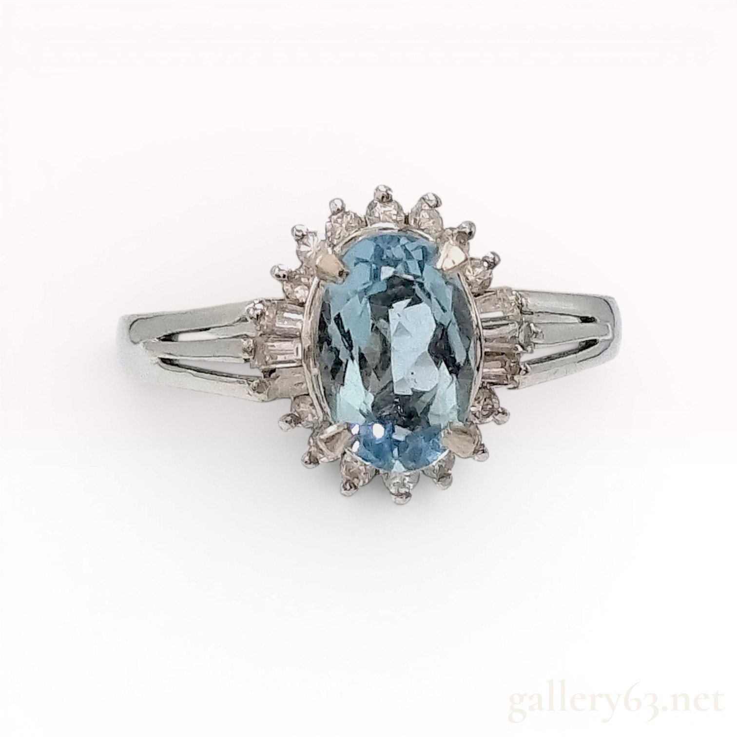 Platinum Oval 1.08ct Blue Topaz and Diamond Halo Ring