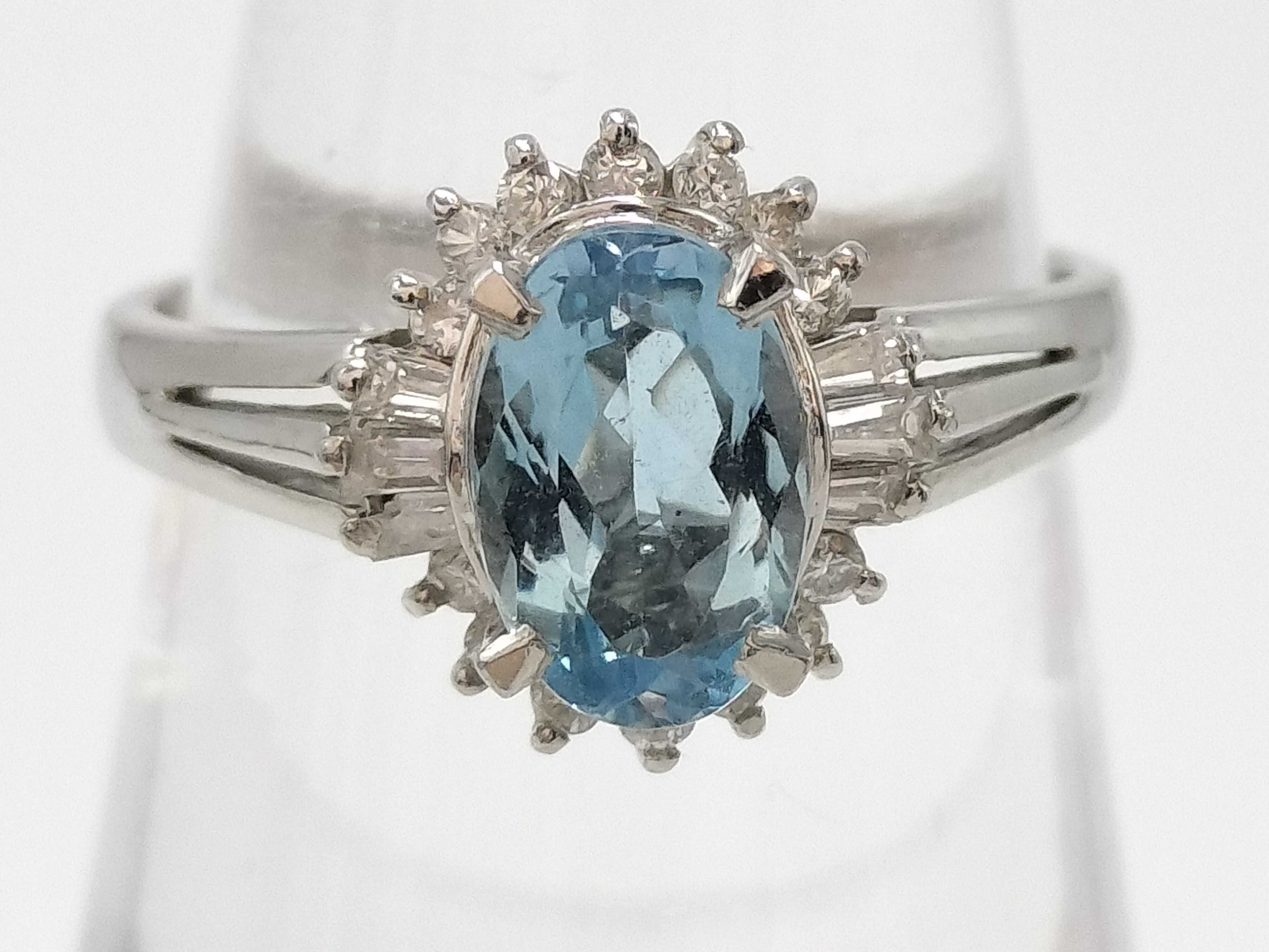 Platinum Oval 1.08ct Blue Topaz and Diamond Halo Ring