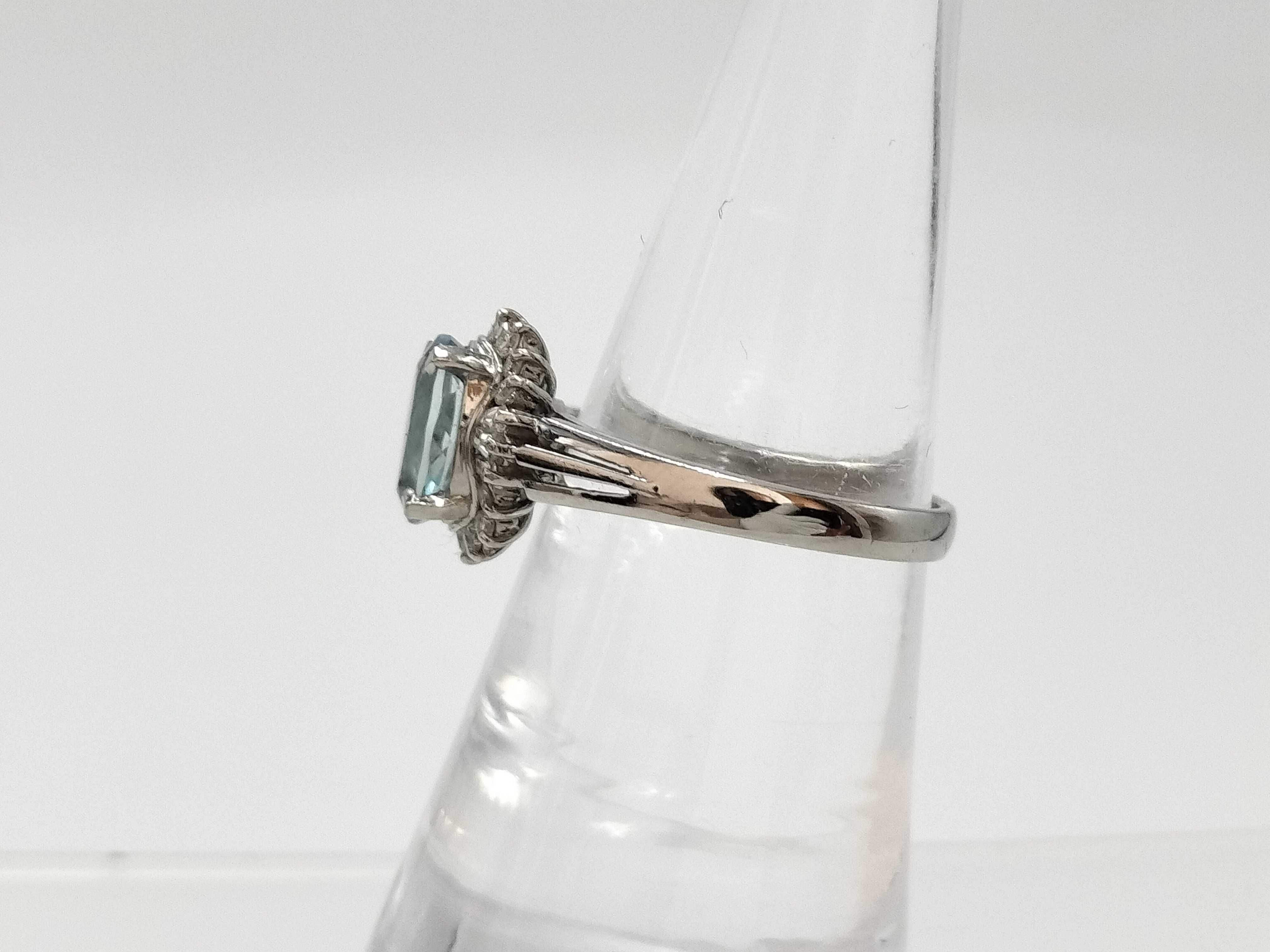 Platinum Oval 1.08ct Blue Topaz and Diamond Halo Ring