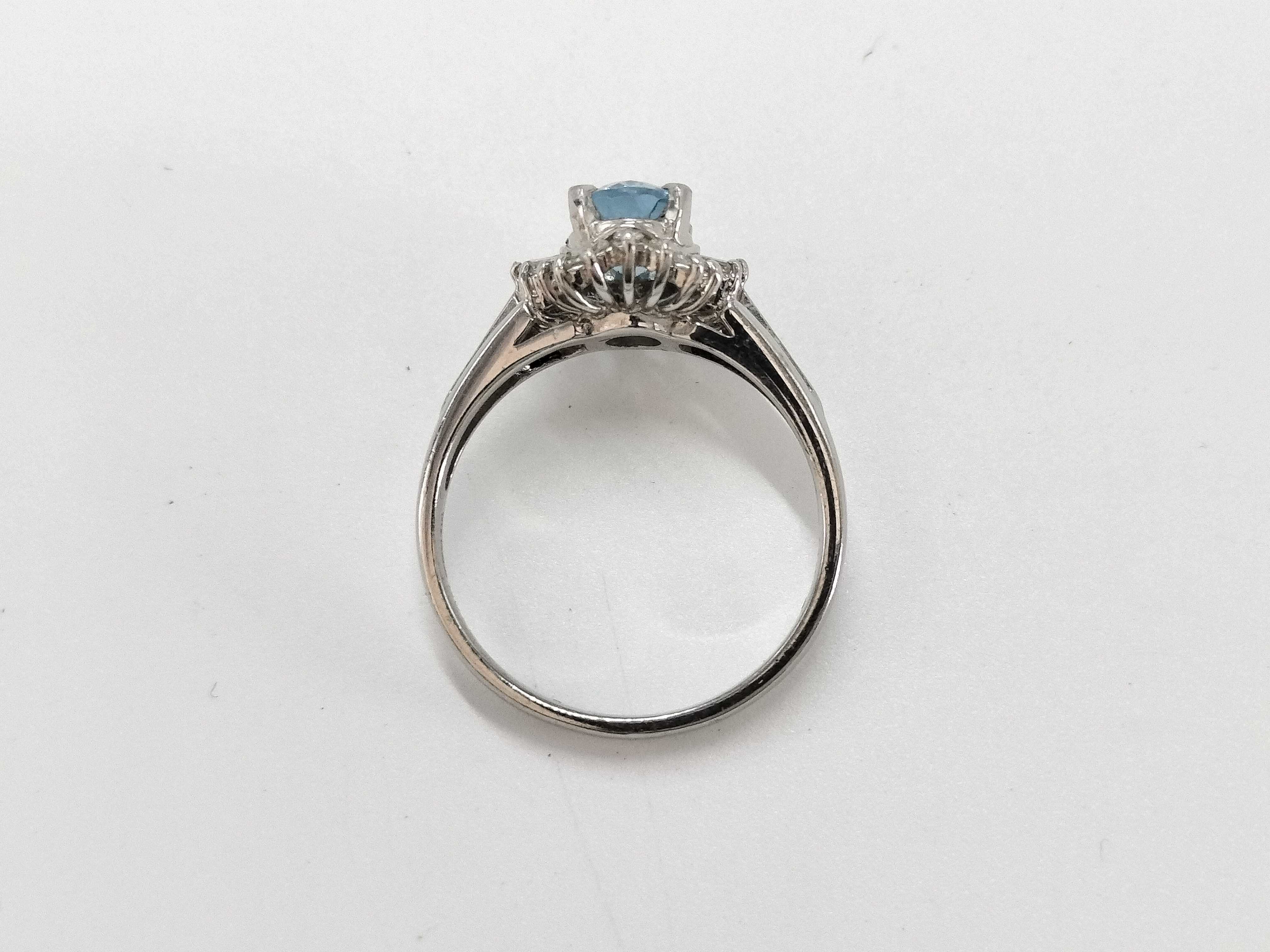 Platinum Oval 1.08ct Blue Topaz and Diamond Halo Ring