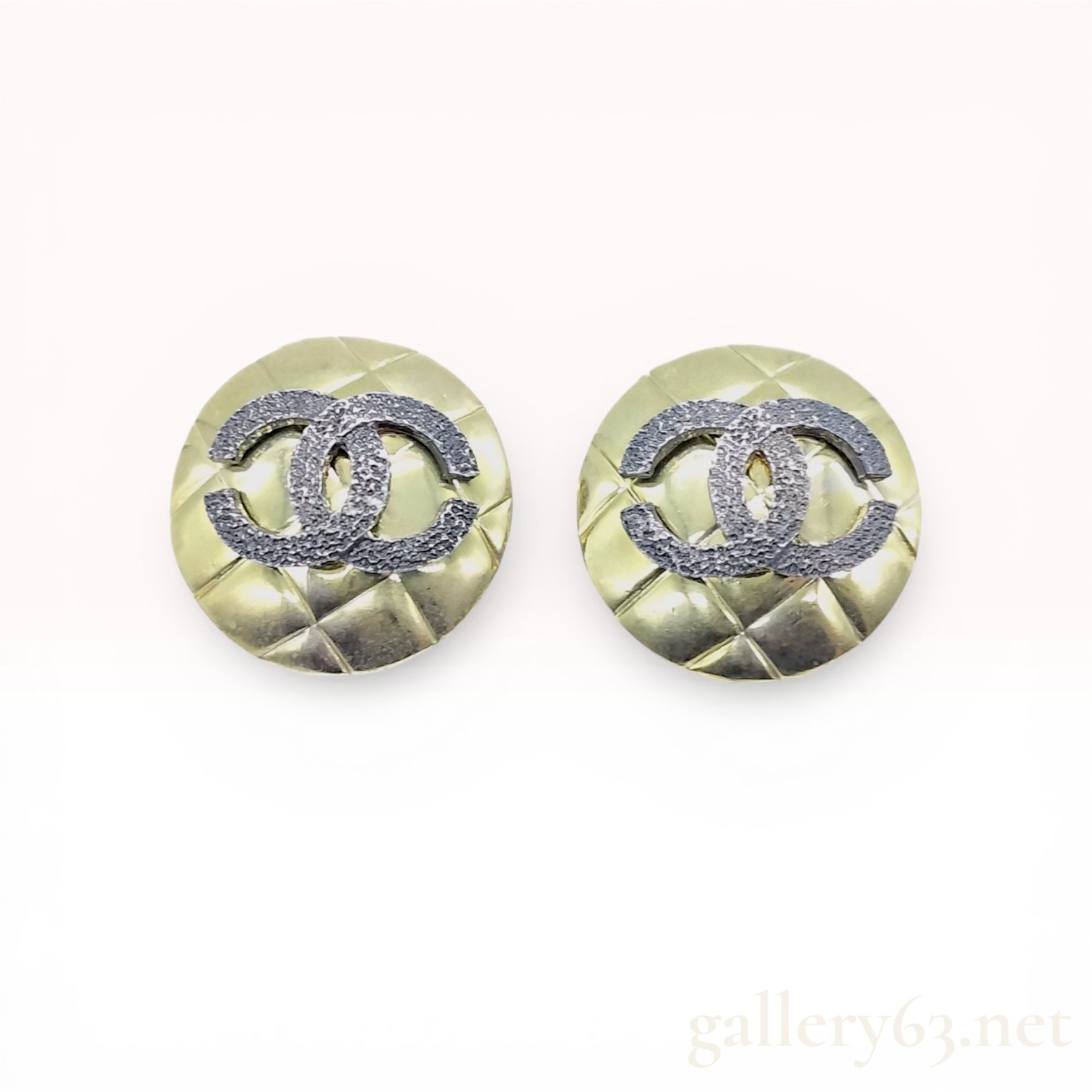 A Pair of Chanel Vintage Quilted CC Logo Clip-On Earrings