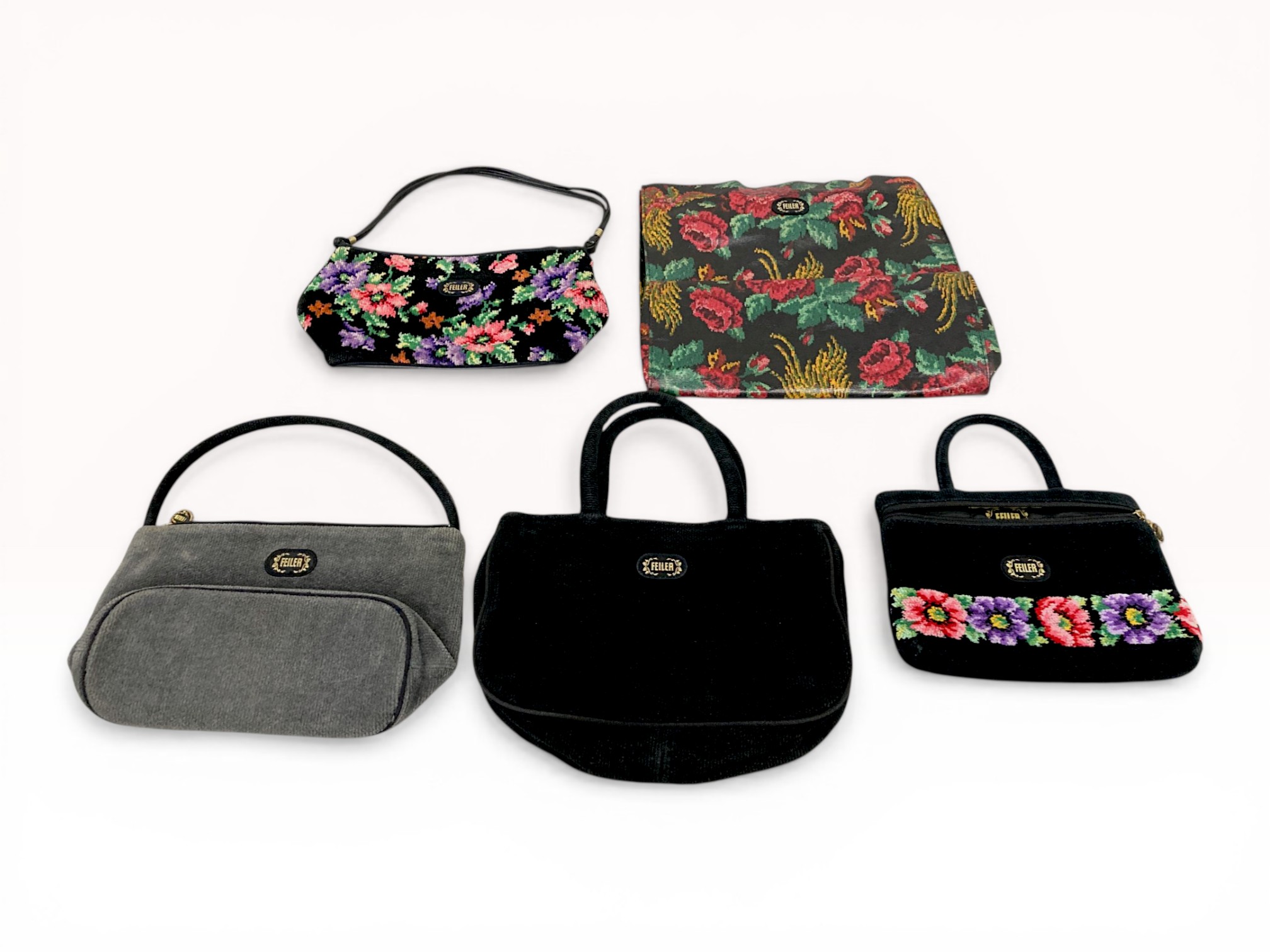 A Set of Five Feiler Chenille and Coated Textile Bags and Pouches