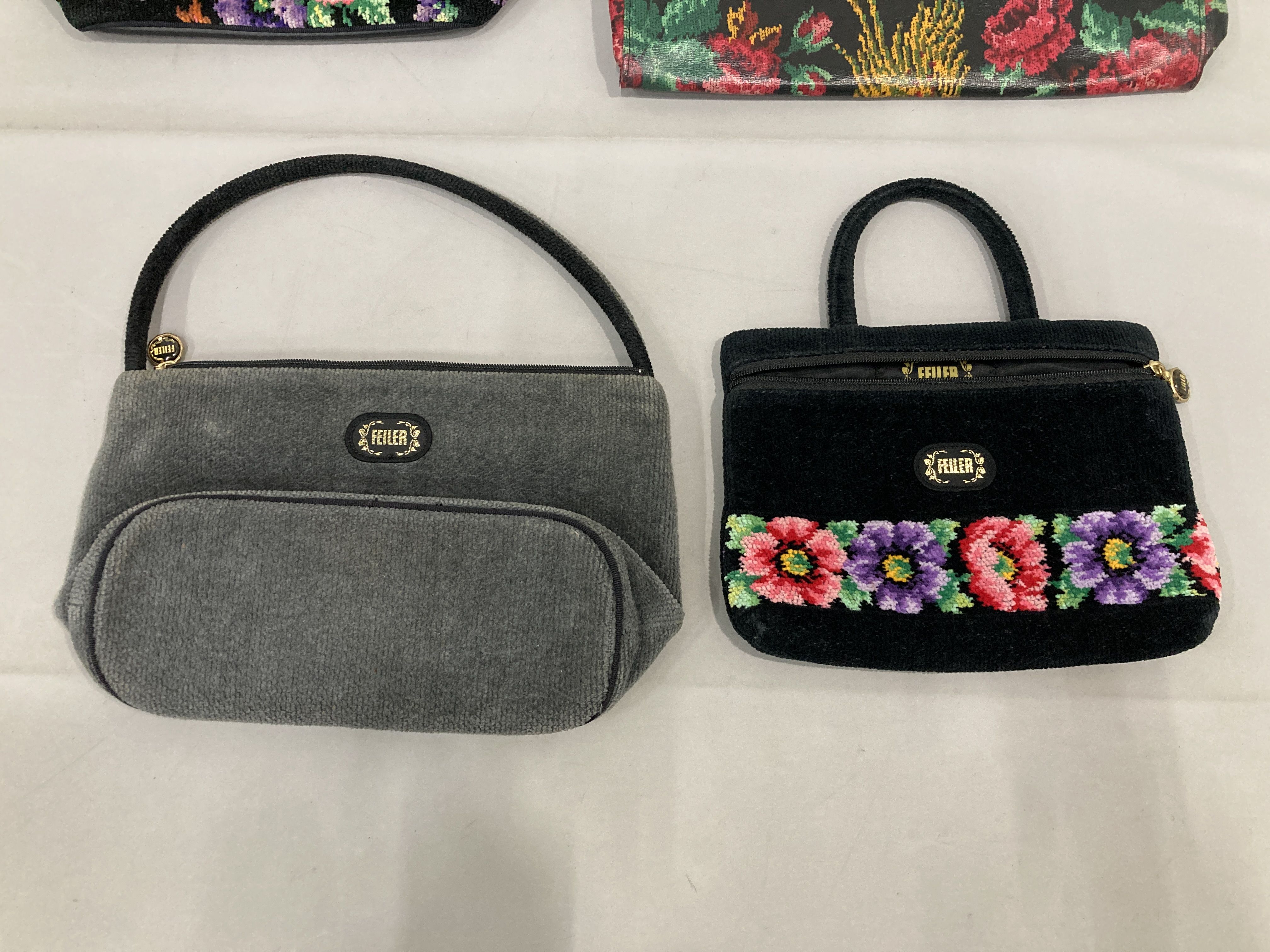 A Set of Five Feiler Chenille and Coated Textile Bags and Pouches