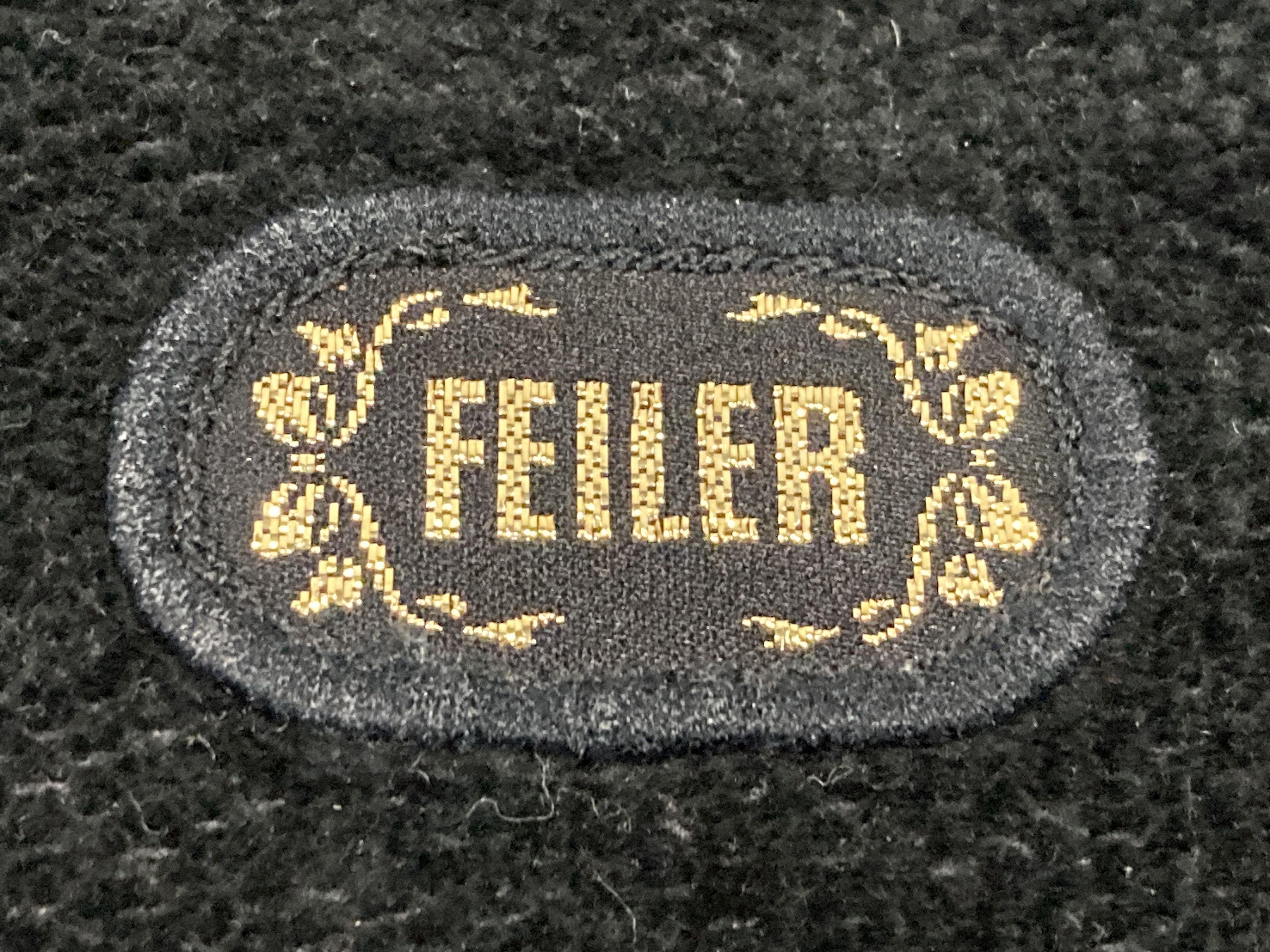 A Set of Five Feiler Chenille and Coated Textile Bags and Pouches