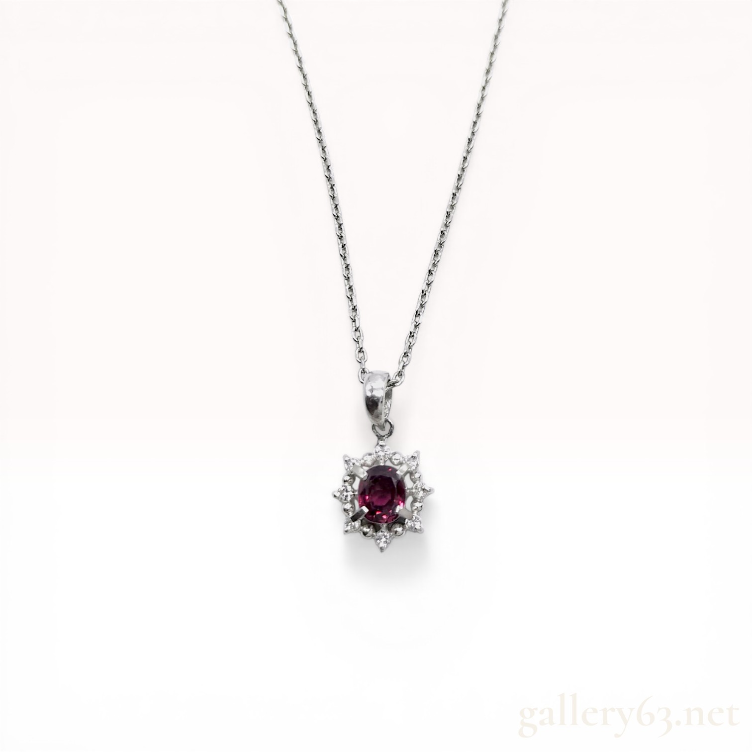 Platinum, Ruby, and Diamond Halo Pendant Necklace