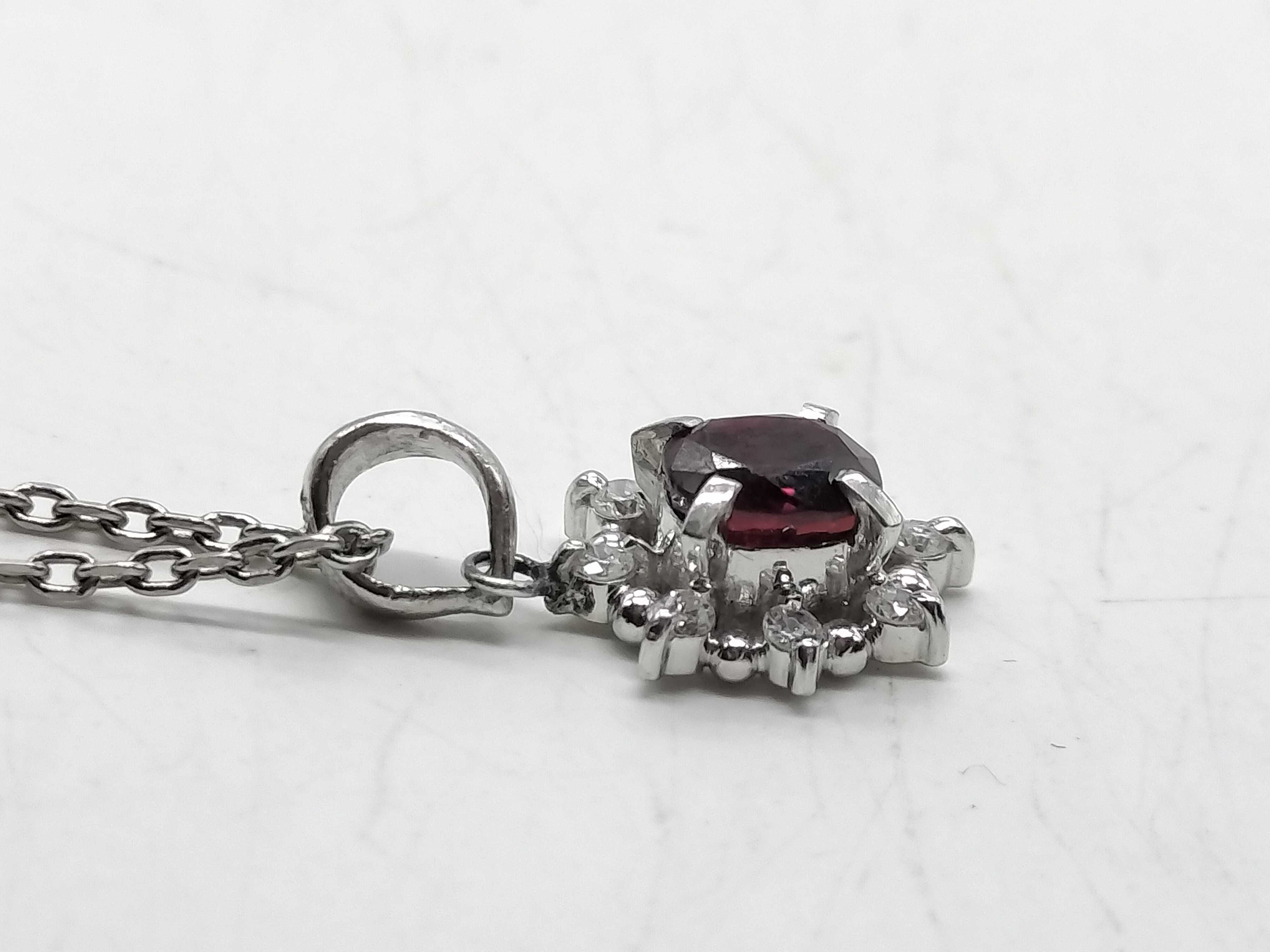 Platinum, Ruby, and Diamond Halo Pendant Necklace
