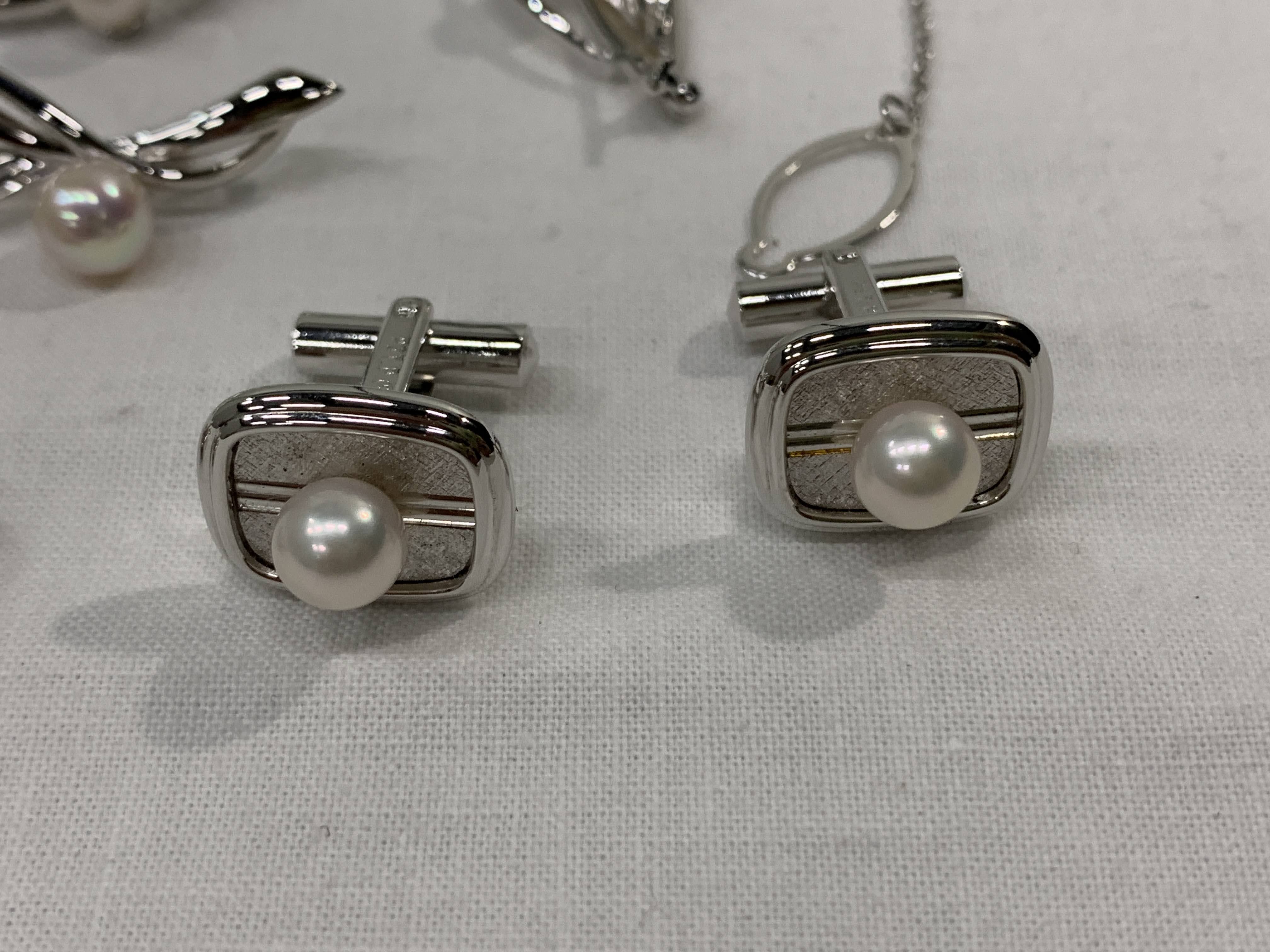 An Eight-Piece Collection of Silver and Cultured Pearl Jewelry, Mid 20th C.