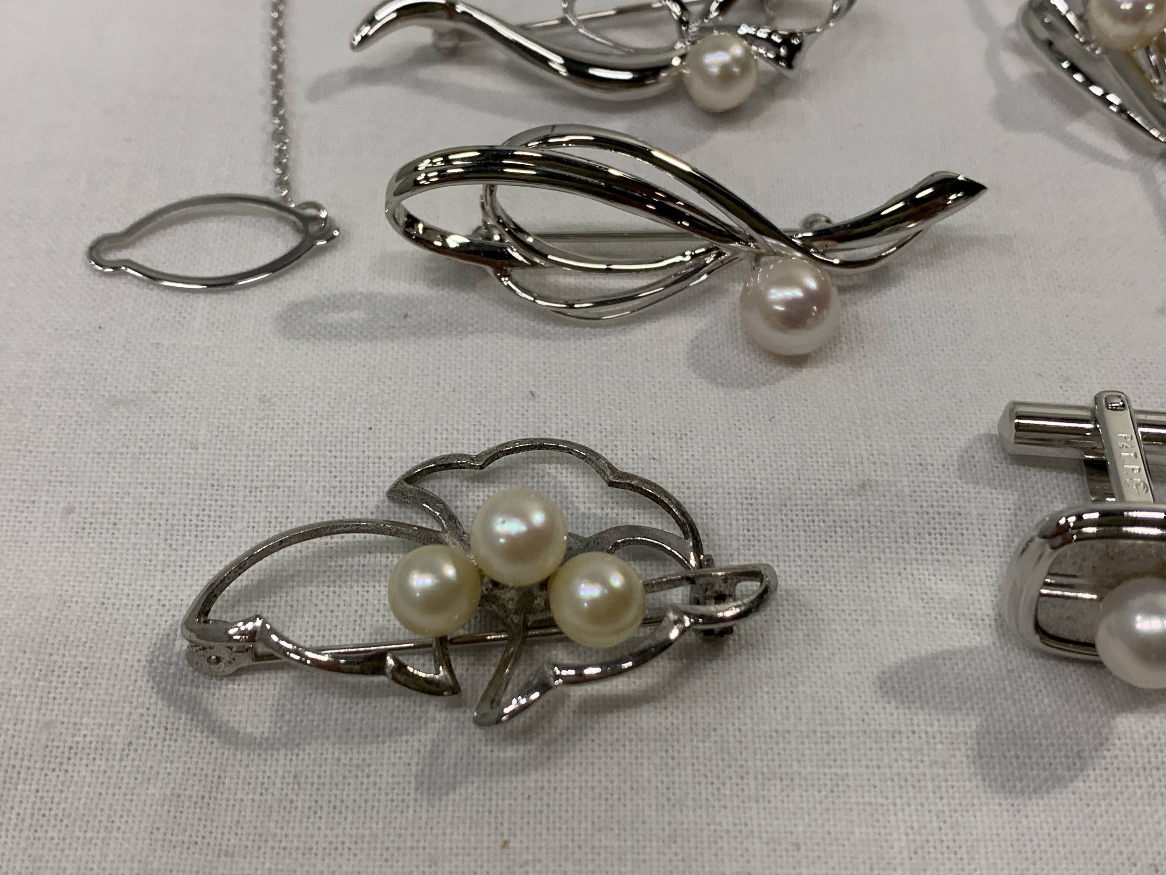 An Eight-Piece Collection of Silver and Cultured Pearl Jewelry, Mid 20th C.