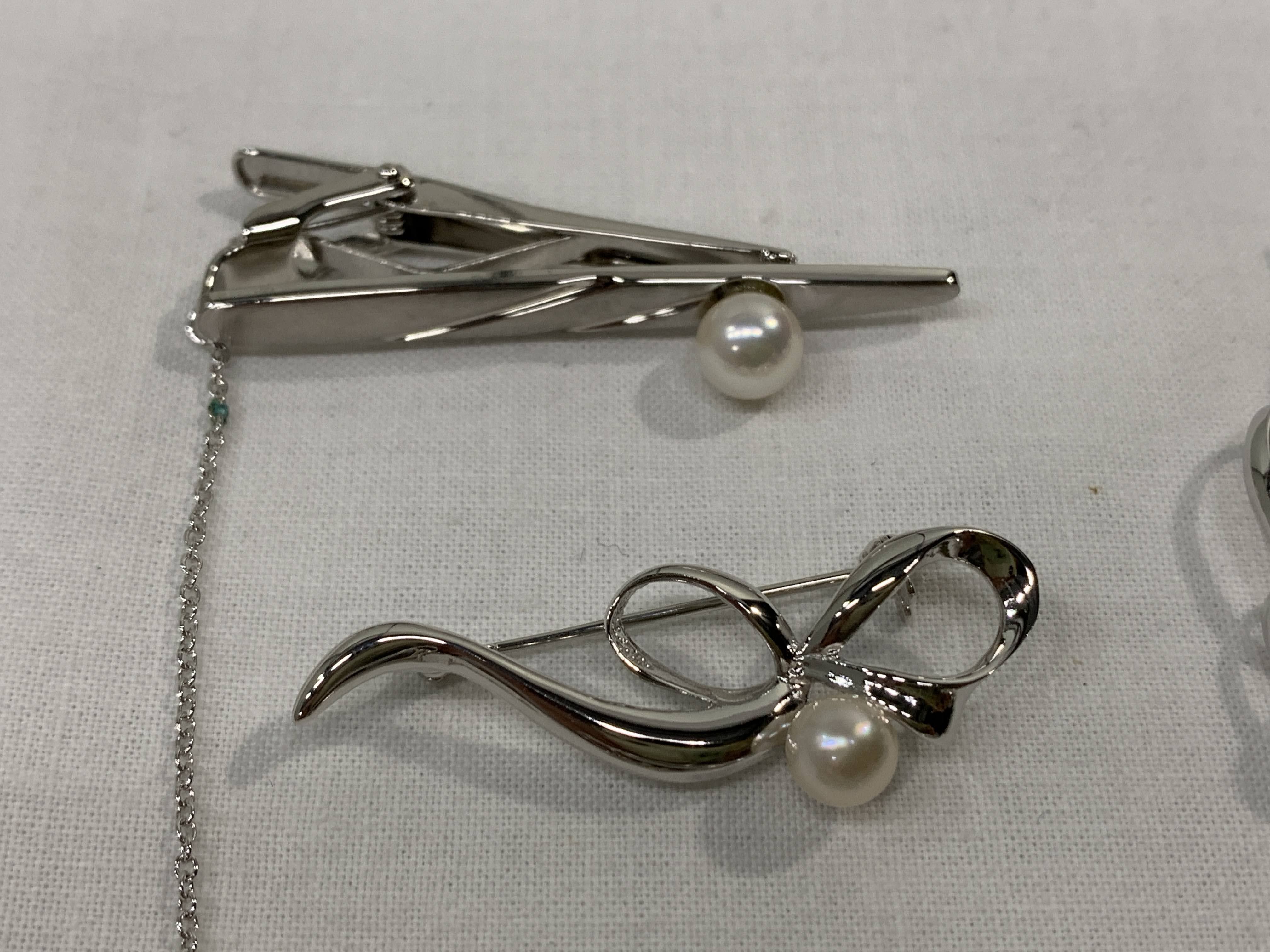 An Eight-Piece Collection of Silver and Cultured Pearl Jewelry, Mid 20th C.