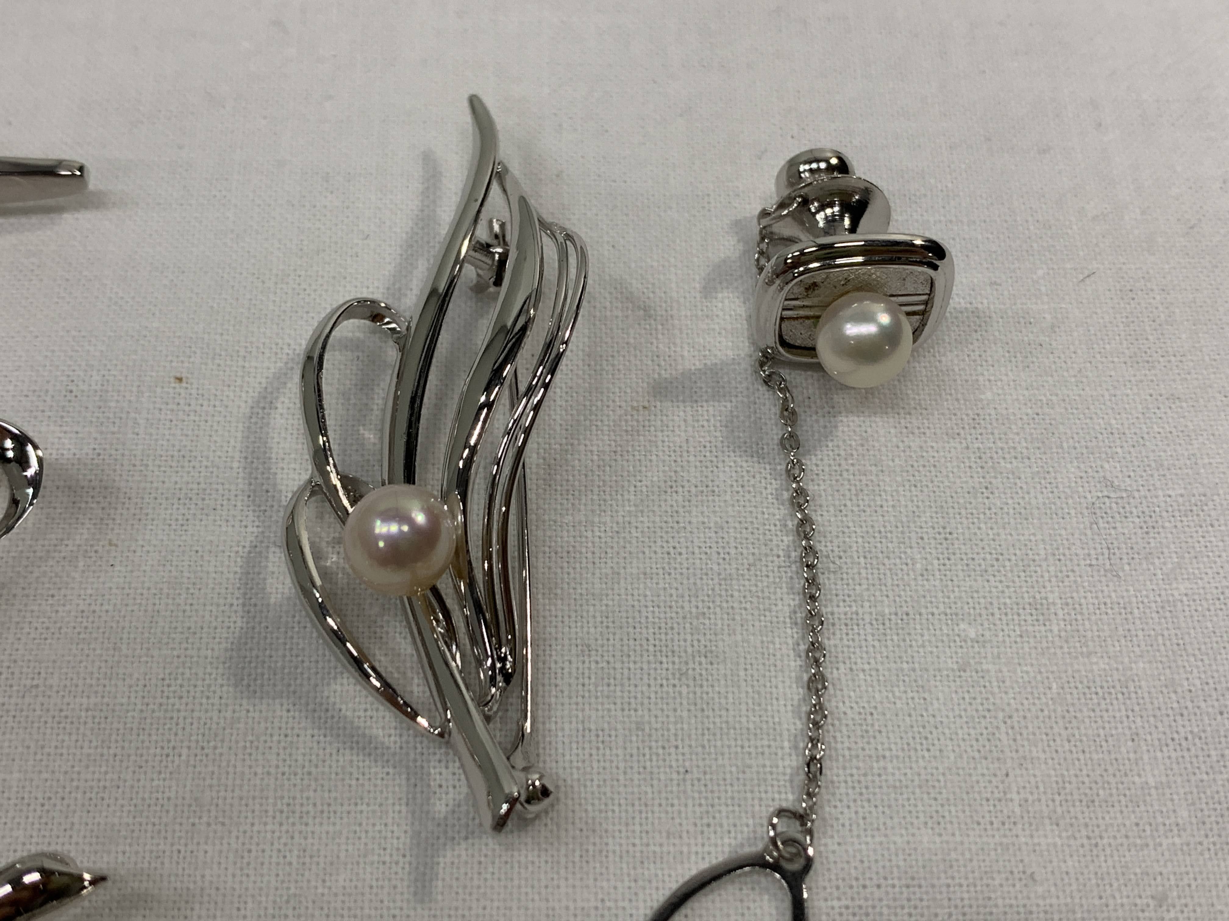 An Eight-Piece Collection of Silver and Cultured Pearl Jewelry, Mid 20th C.