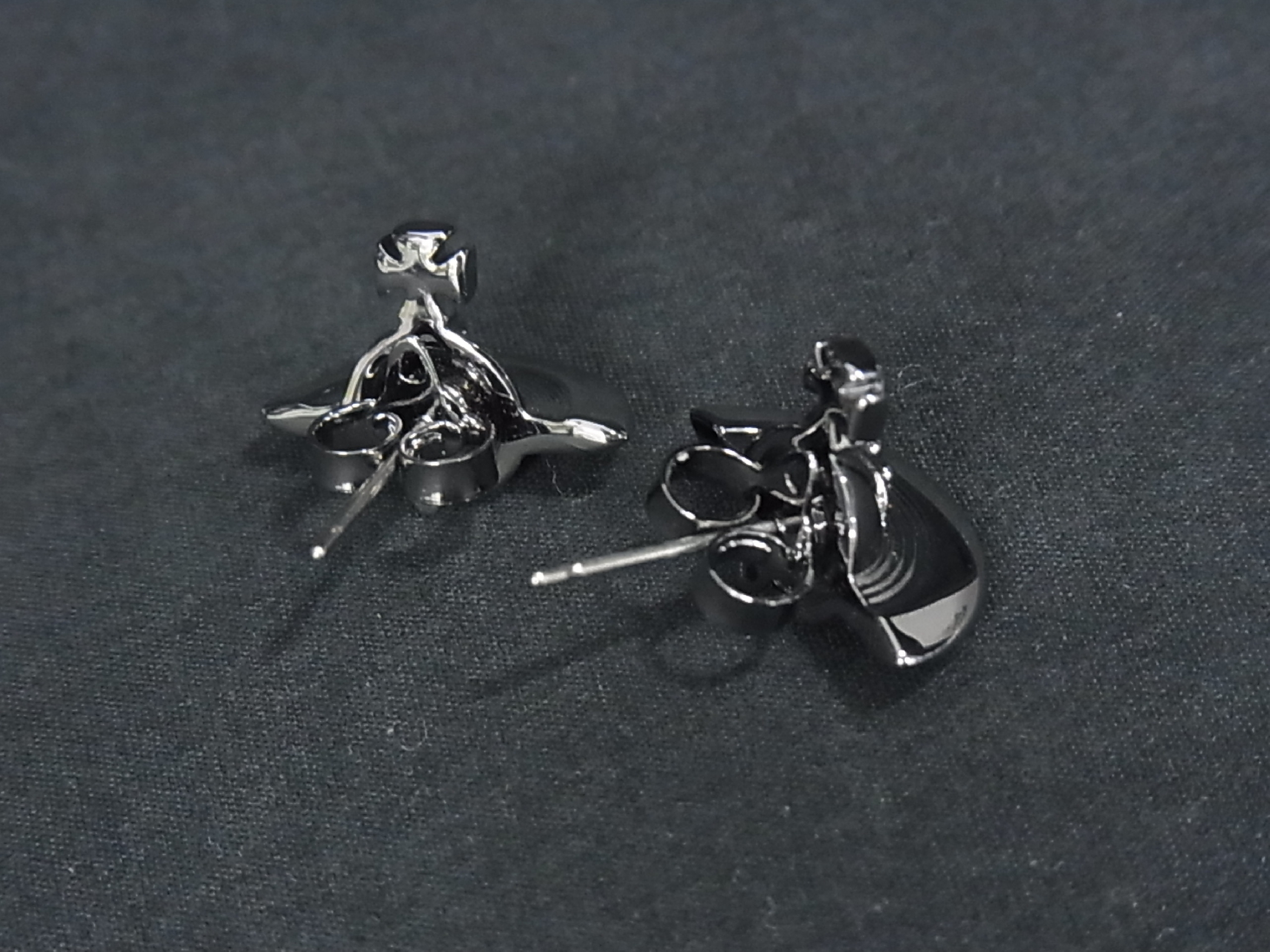 A Pair of Vivienne Westwood Petite Orb Gunmetal Tone Stud Earrings