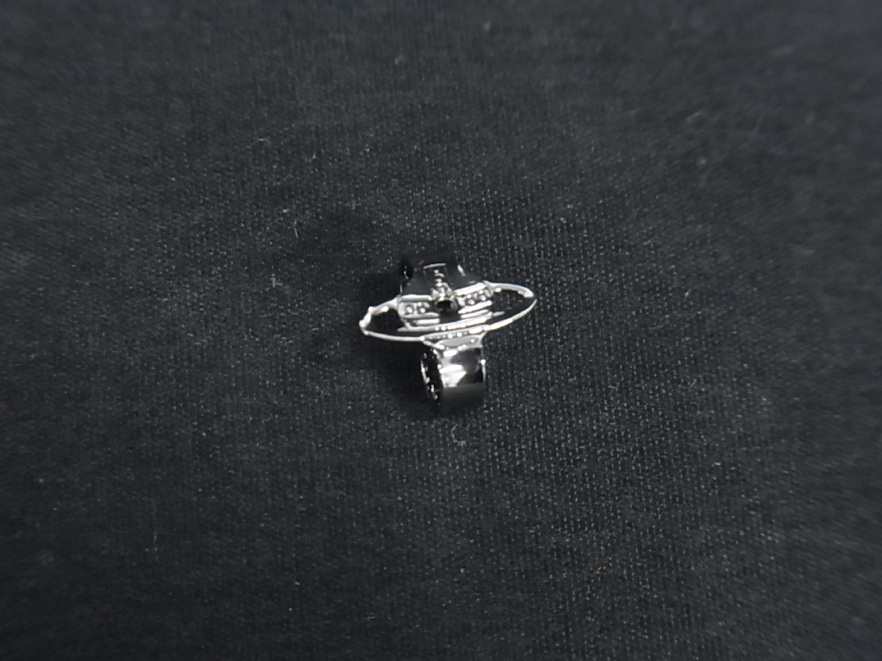 A Pair of Vivienne Westwood Petite Orb Gunmetal Tone Stud Earrings