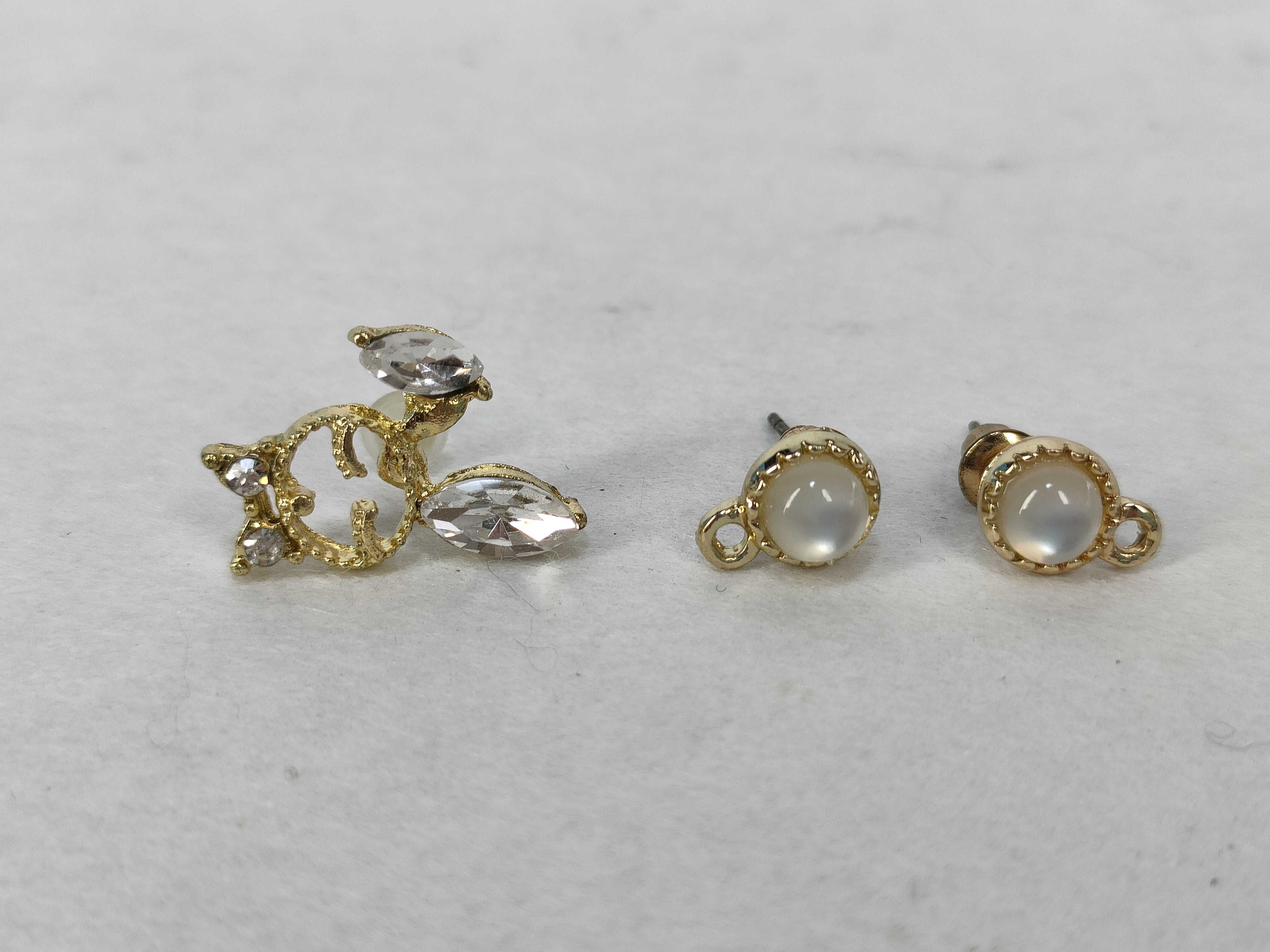 An Assortment of Gold-Tone Fashion Stud Earrings Including Market Gate Style Filigree