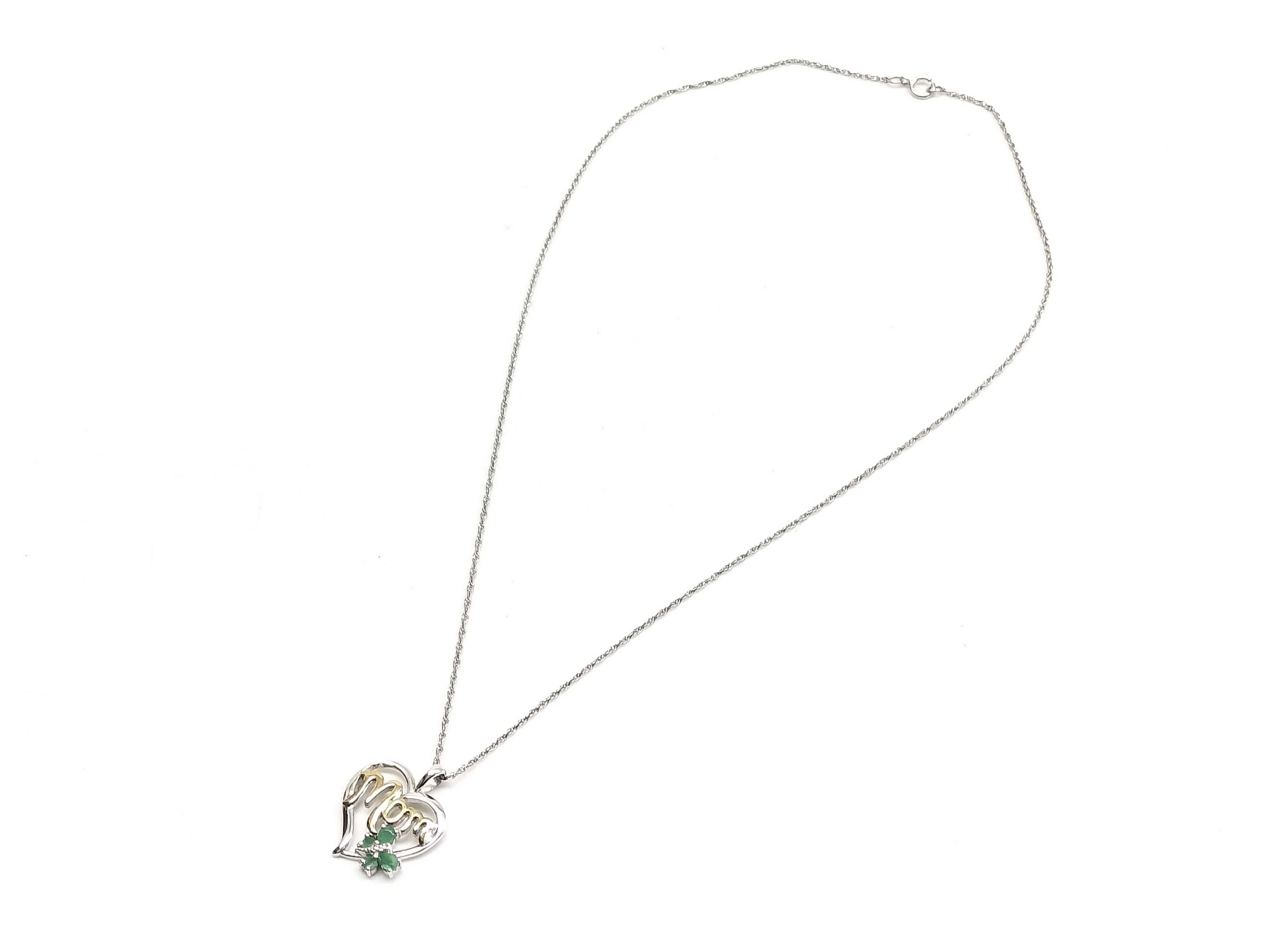 Two Pieces of Sterling Silver Jewelry Including an ete Bypass Ring and a 14K Gold Accent Mom Pendant Necklace