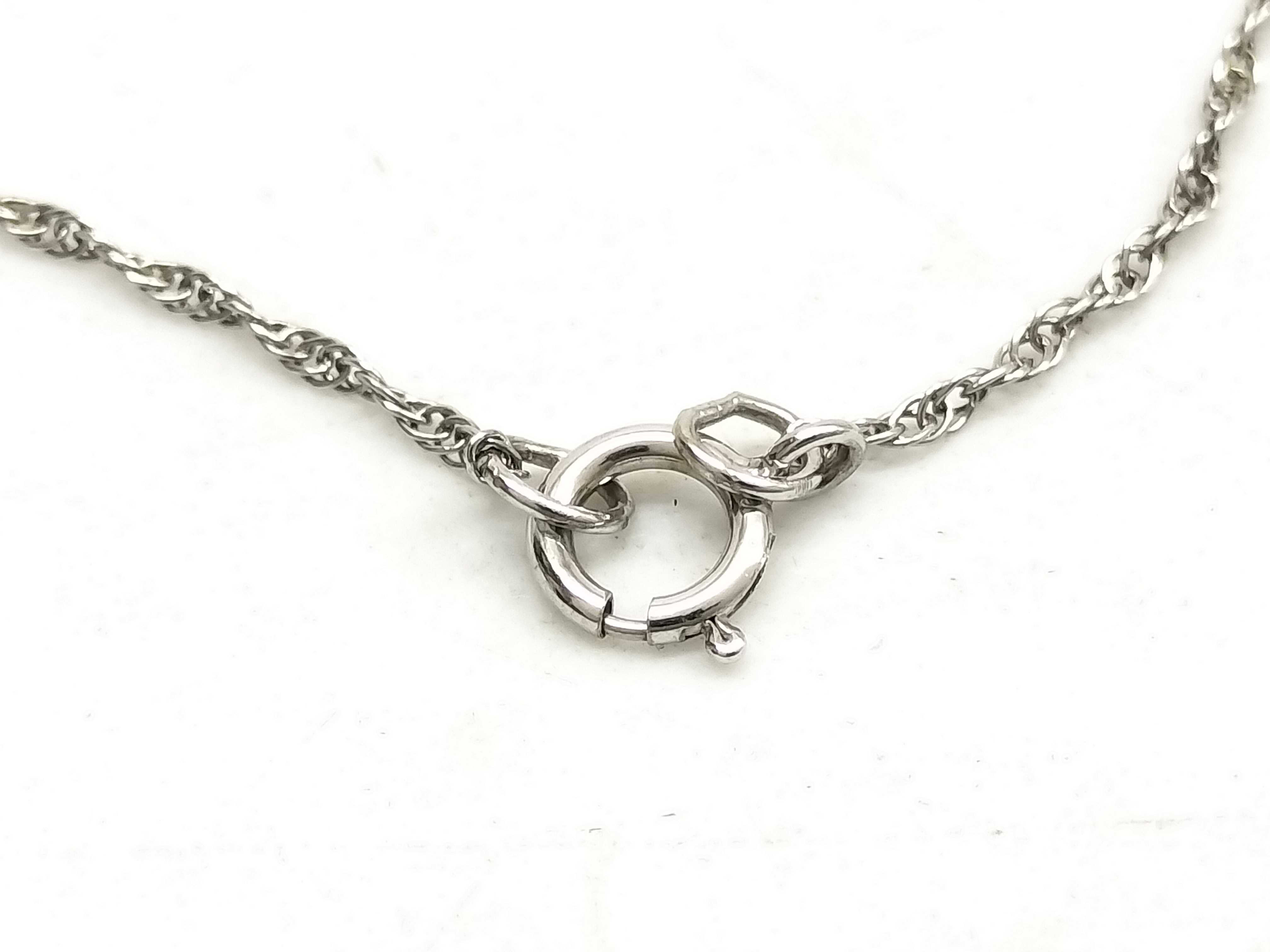Two Pieces of Sterling Silver Jewelry Including an ete Bypass Ring and a 14K Gold Accent Mom Pendant Necklace