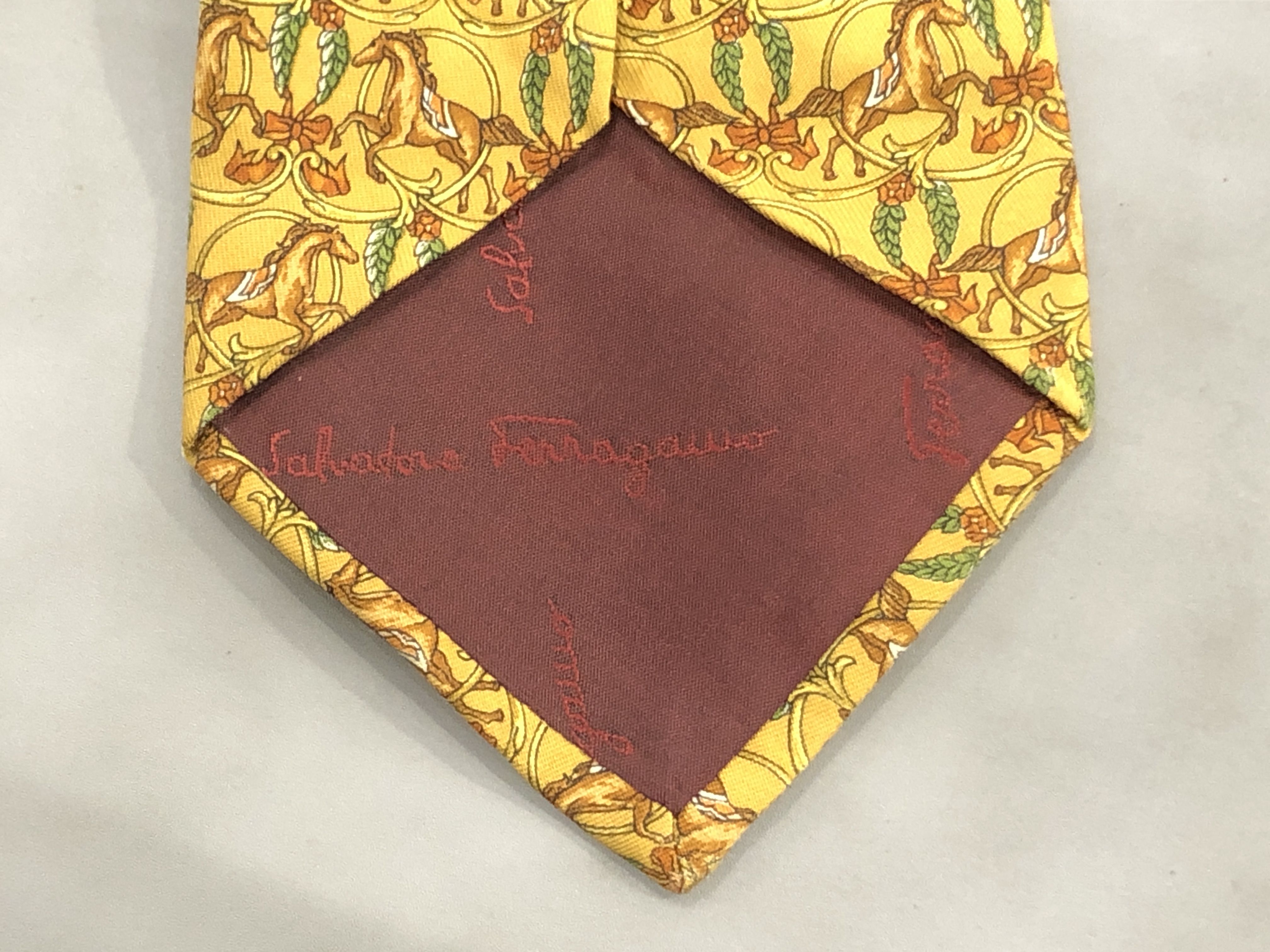 A Group of Five Designer Silk Neckties Including Dunhill and Salvatore Ferragamo