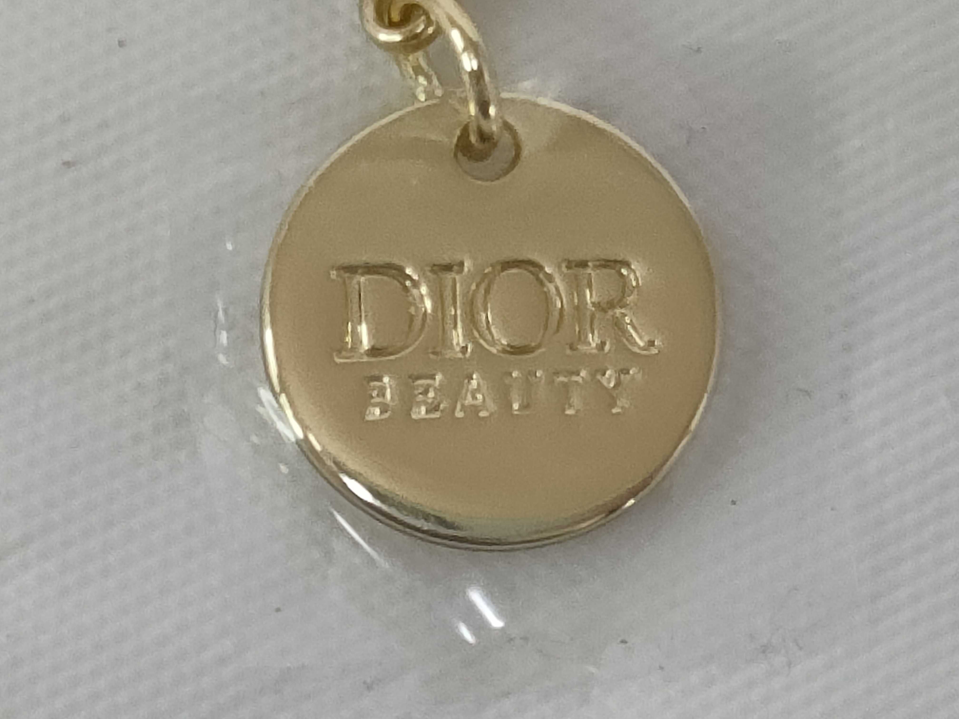 Dior Beauty Gold-Tone Star and Logo Charm Phone Strap and Bracelet