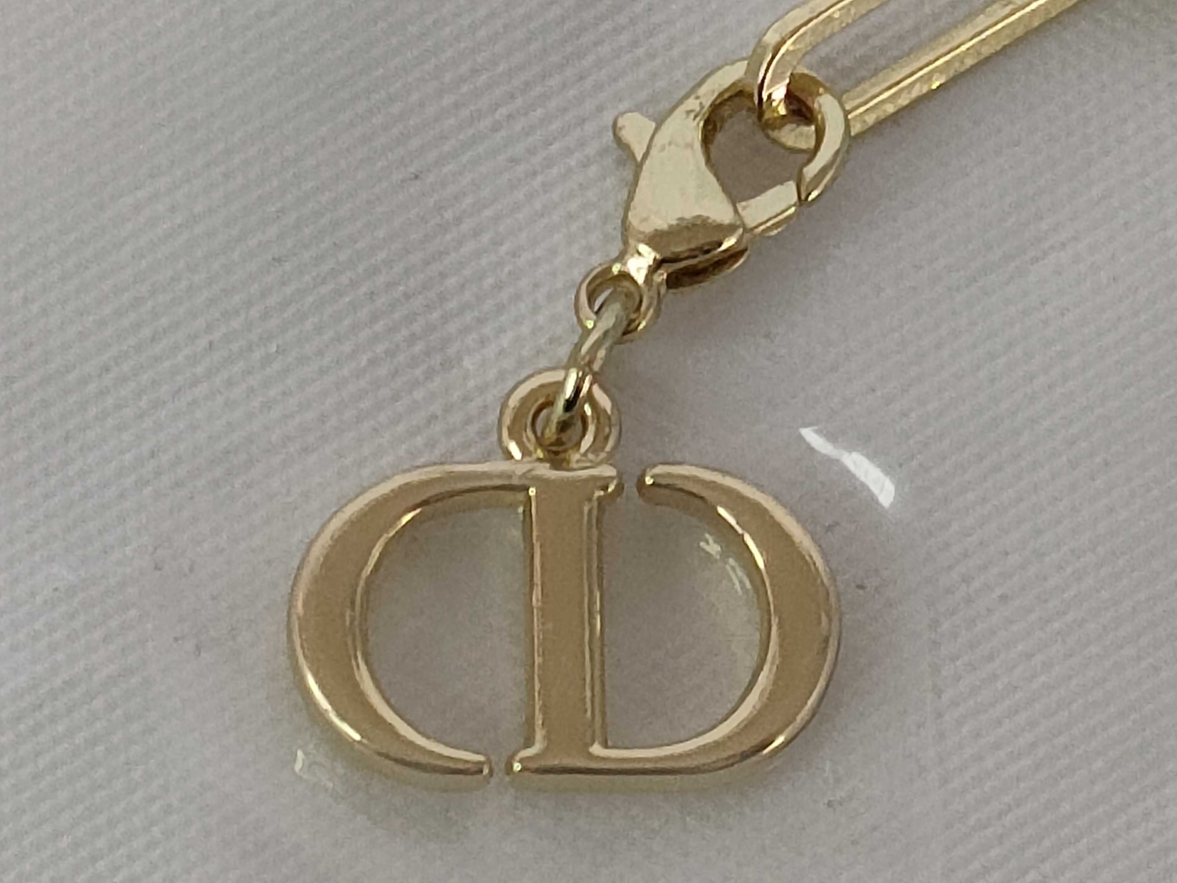 Dior Beauty Gold-Tone Star and Logo Charm Phone Strap and Bracelet