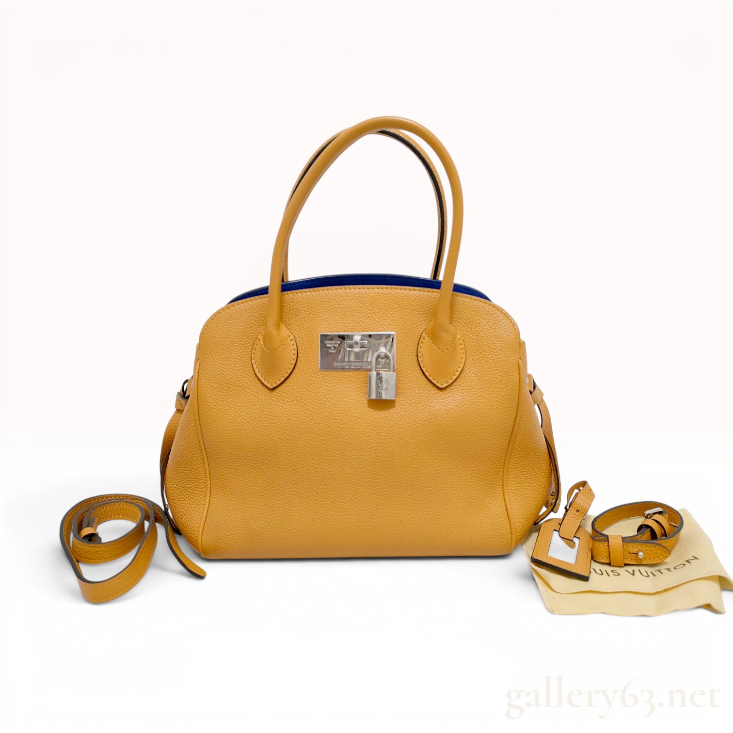 Louis Vuitton Milla PM Taurillon Leather Handbag
