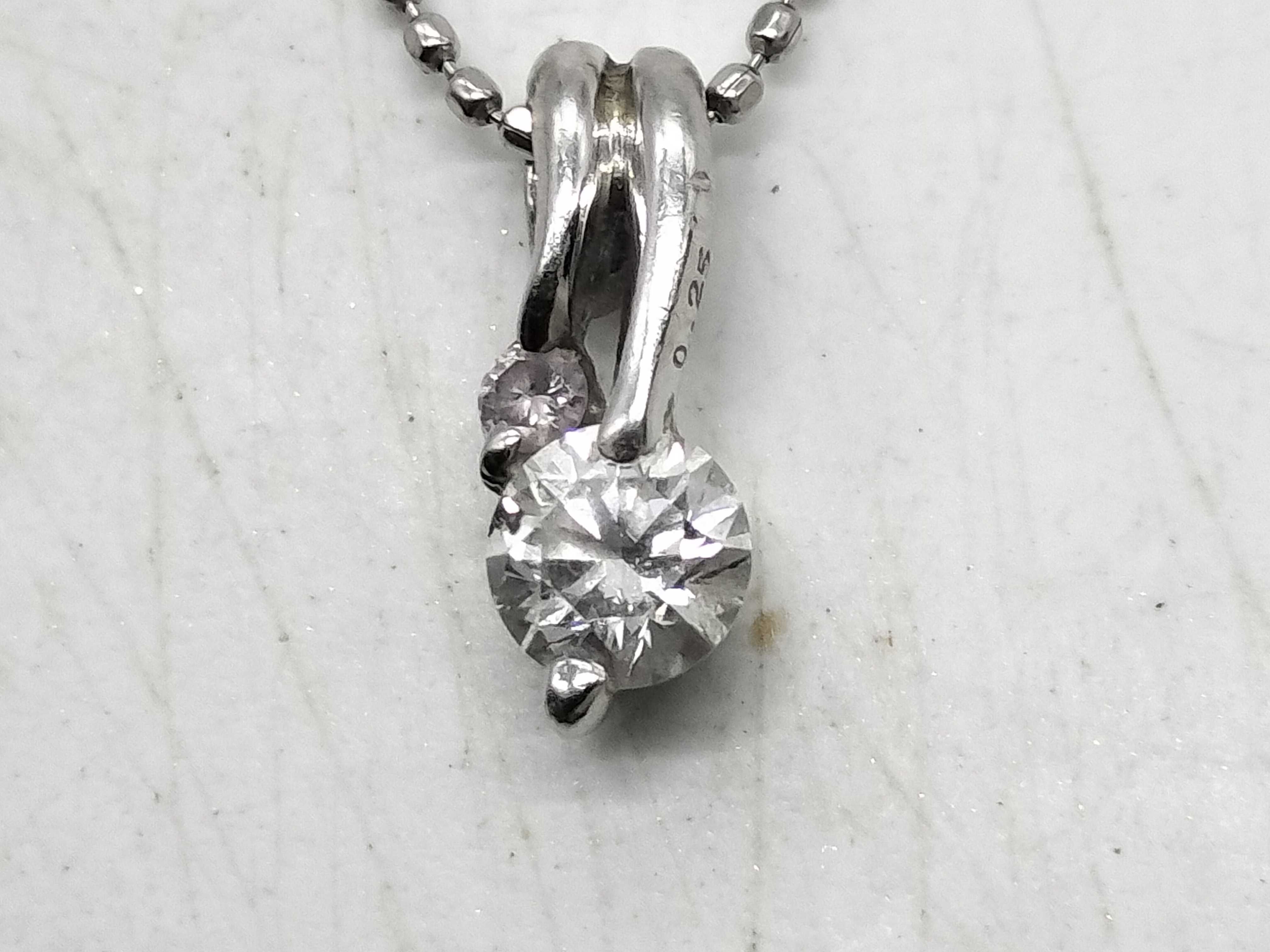 Diamond and Platinum Bypass Pendant Necklace with 0.25 Carat Diamond