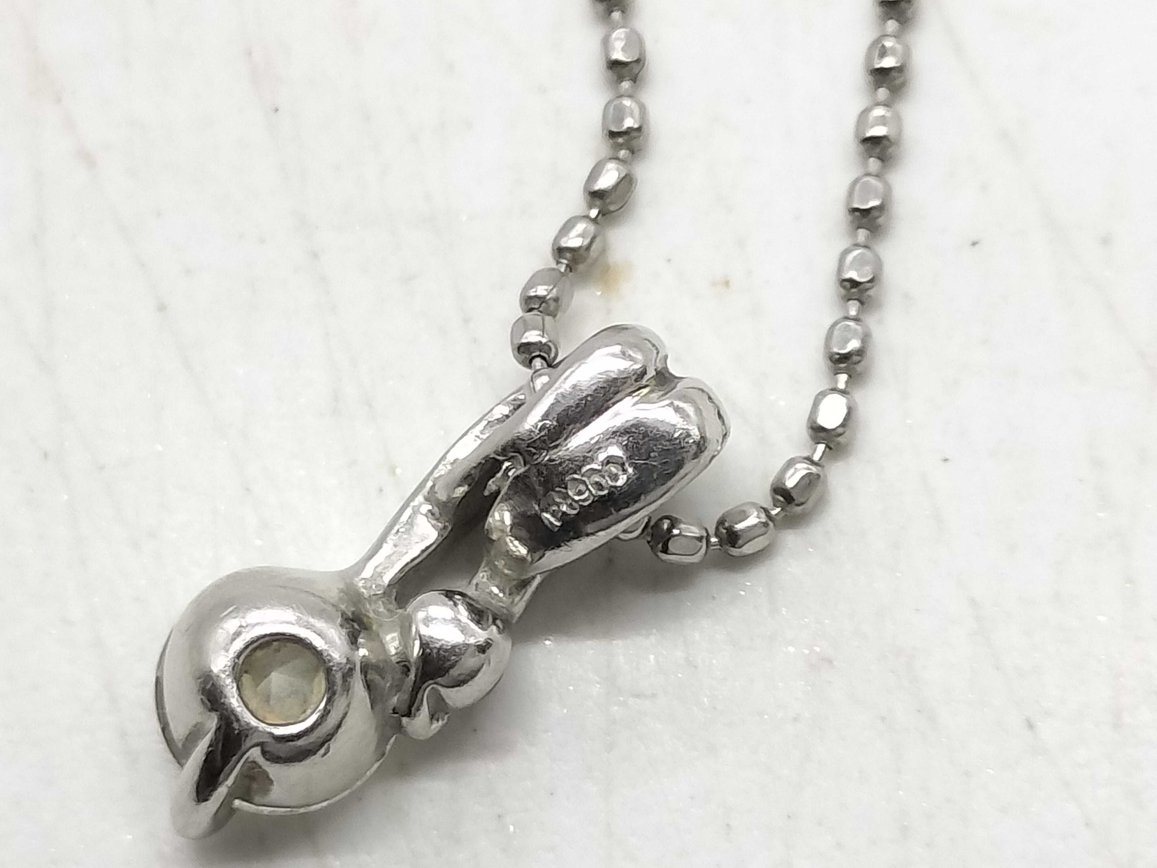 Diamond and Platinum Bypass Pendant Necklace with 0.25 Carat Diamond