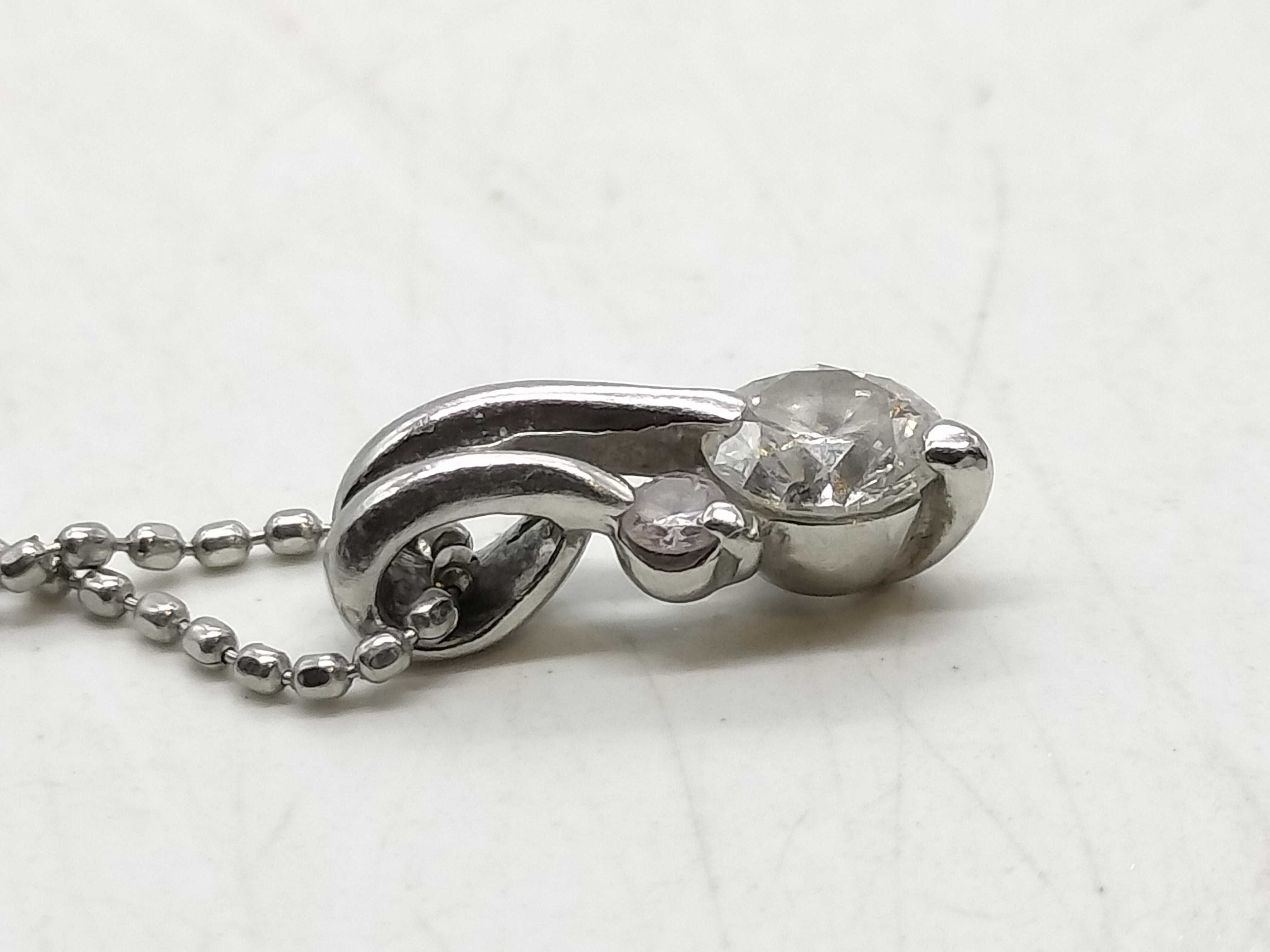 Diamond and Platinum Bypass Pendant Necklace with 0.25 Carat Diamond