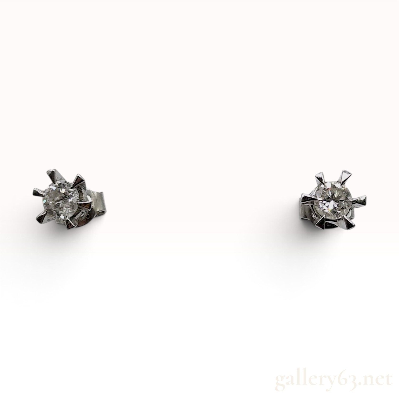 A Pair of Platinum and Diamond Stud Earrings