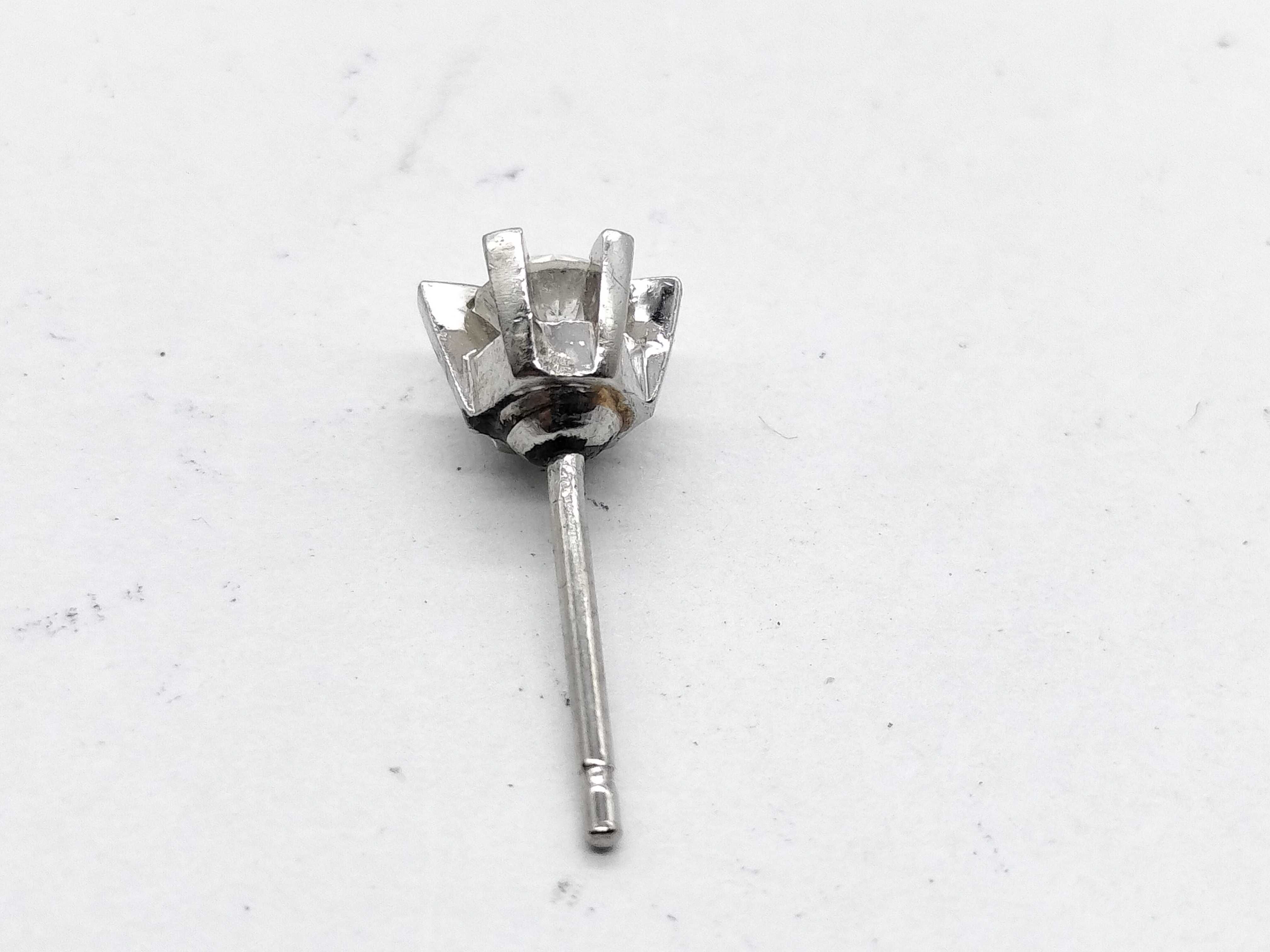 A Pair of Platinum and Diamond Stud Earrings