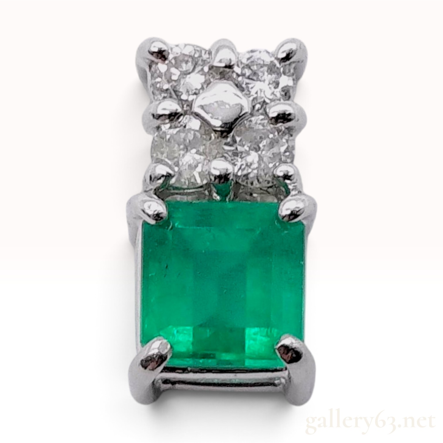 Platinum 0.66 Carat Emerald and 0.15 Carat Diamond Pendant