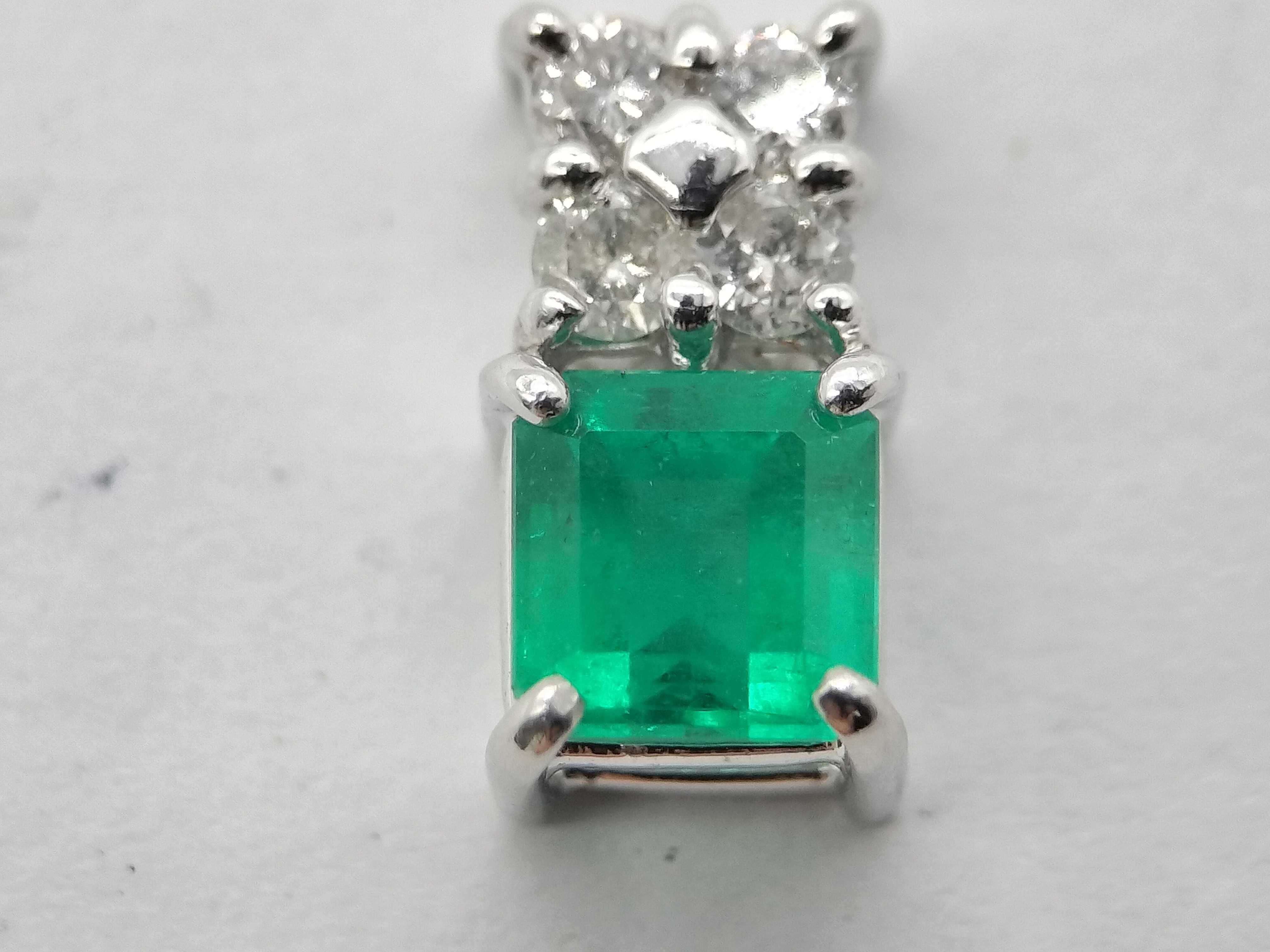 Platinum 0.66 Carat Emerald and 0.15 Carat Diamond Pendant