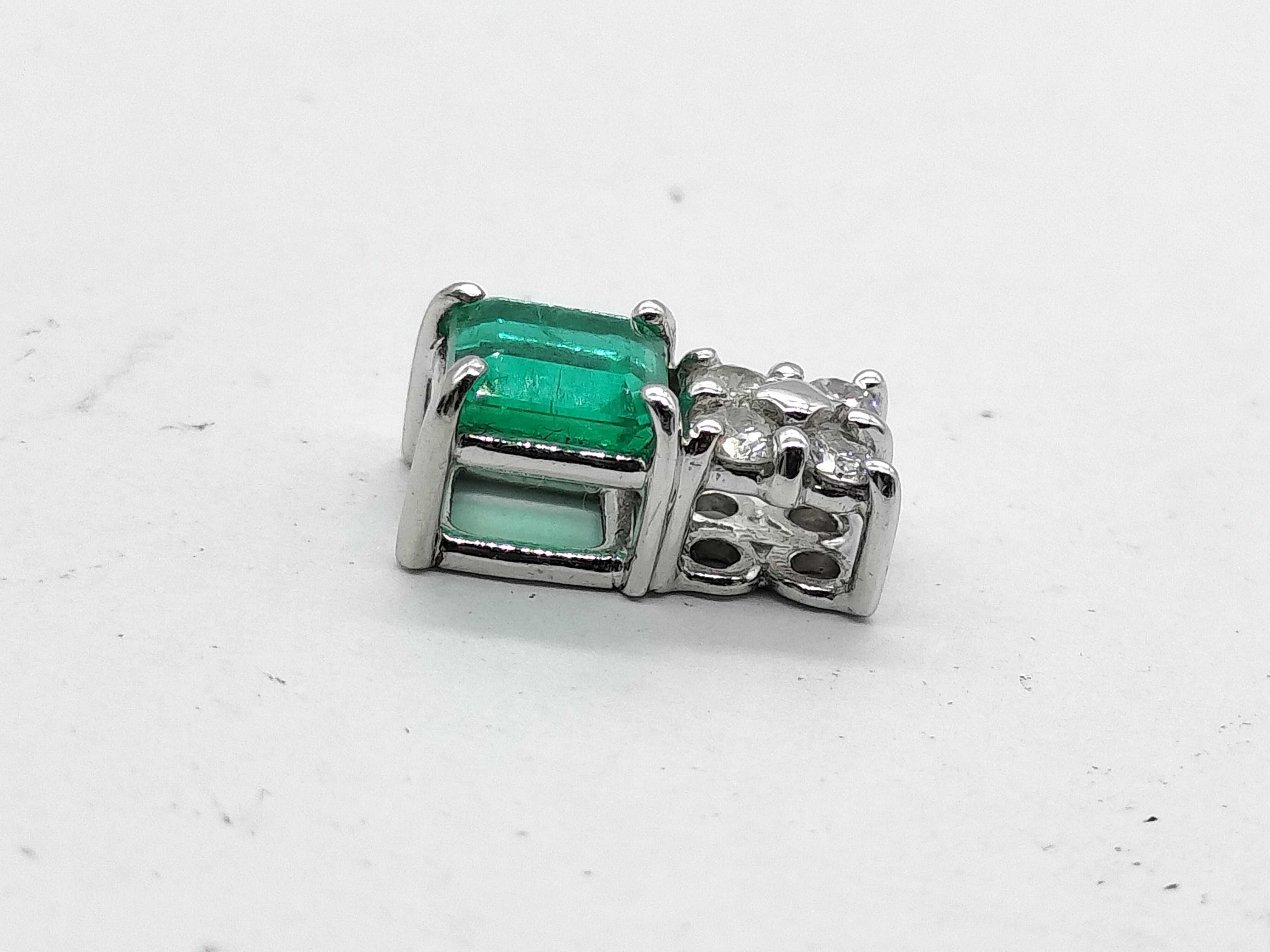 Platinum 0.66 Carat Emerald and 0.15 Carat Diamond Pendant