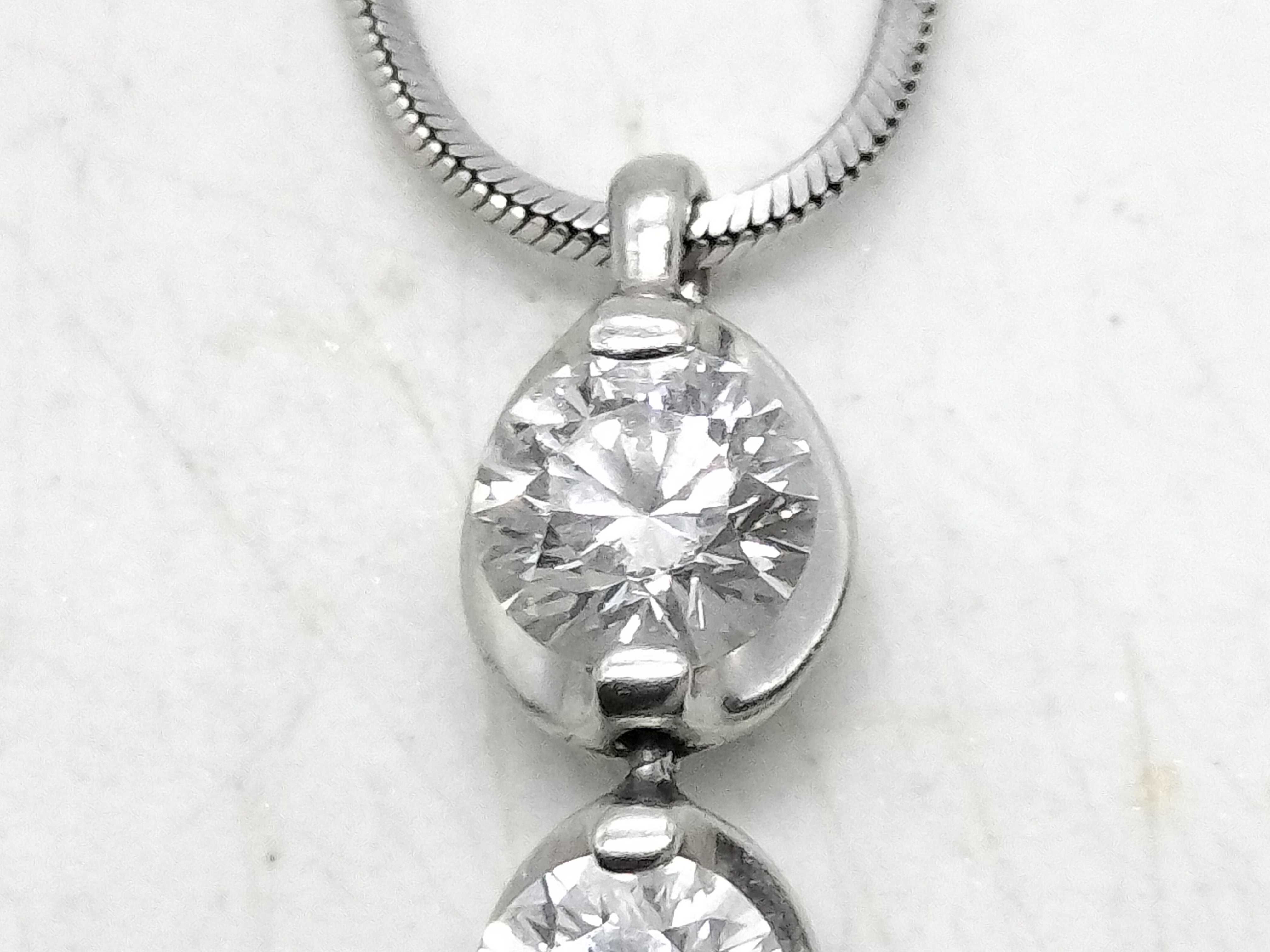 Trilogy Platinum and 1.01 Carat Diamond Three Stone Pendant Necklace