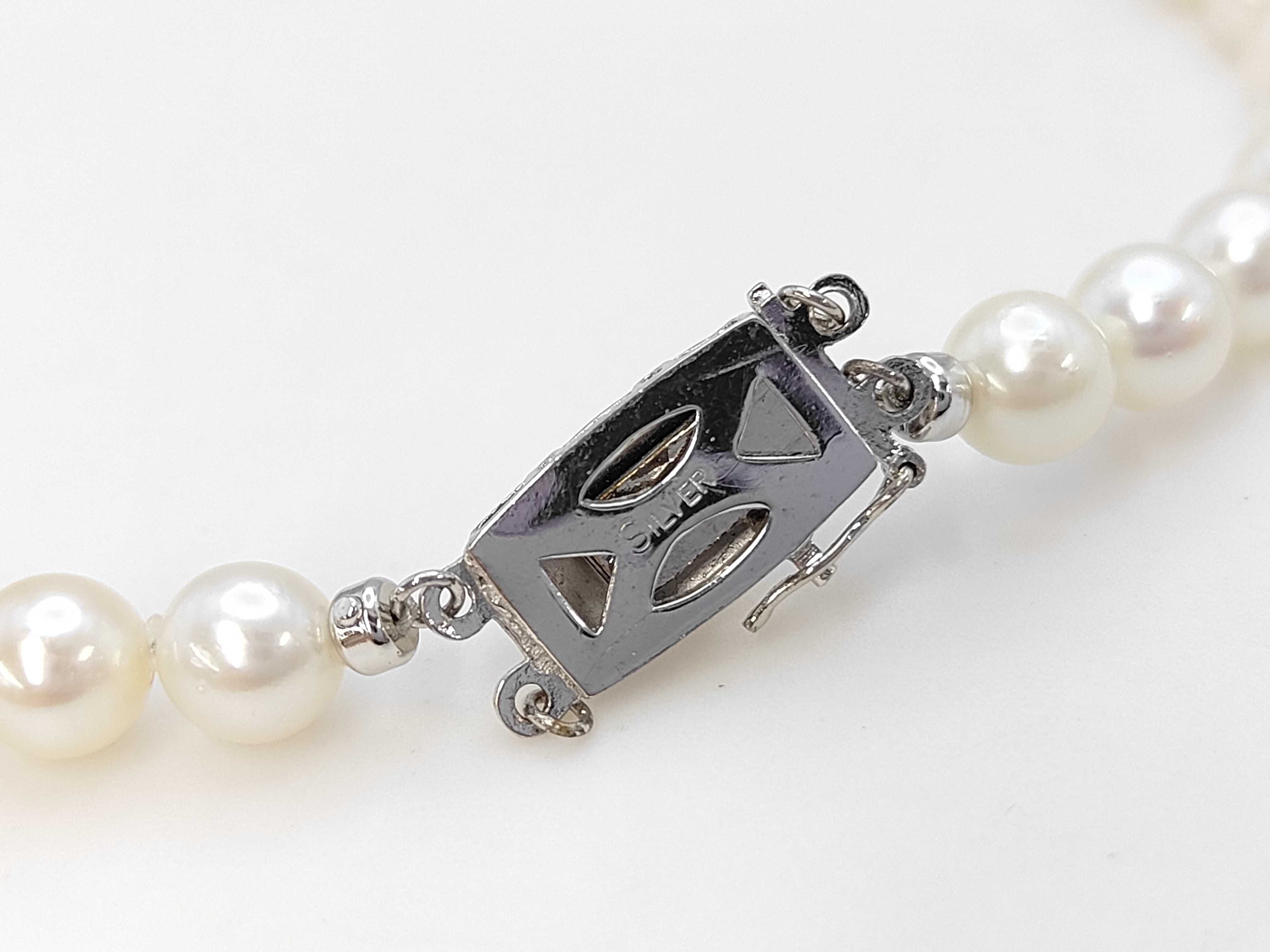 Single Strand Semi-Round Cultured Pearl Necklace with Silver Clasp