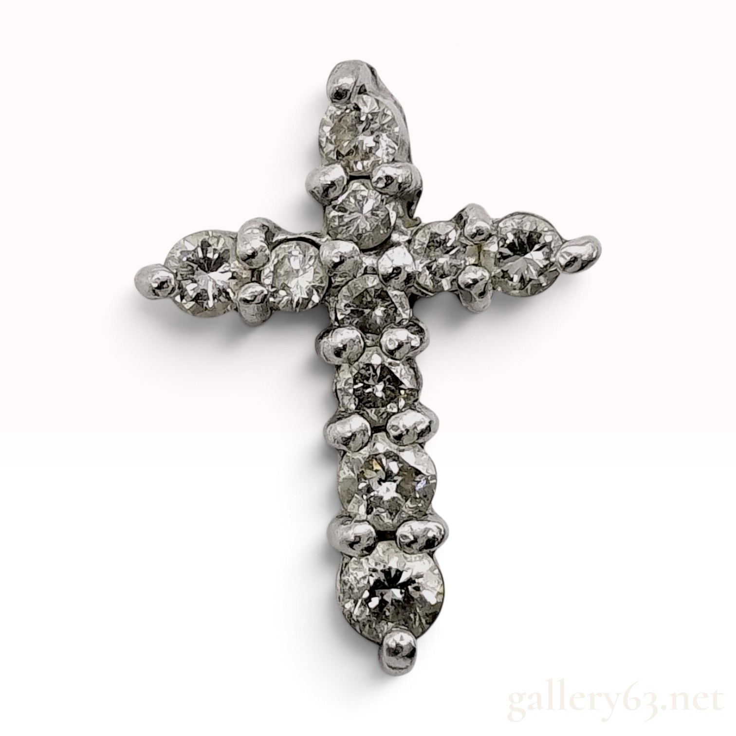 Platinum and 0.20 Carat Diamond Cross Pendant