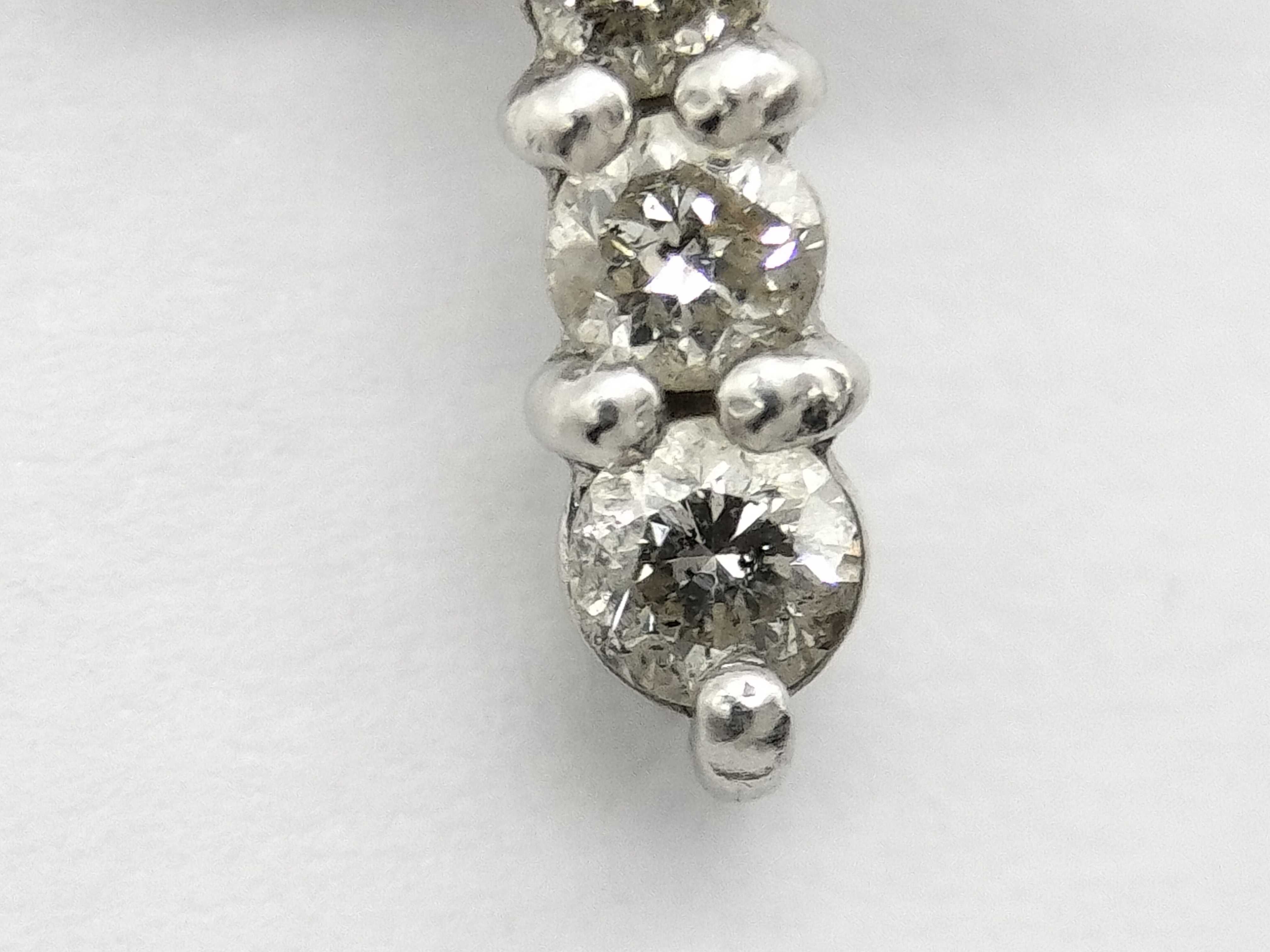 Platinum and 0.20 Carat Diamond Cross Pendant