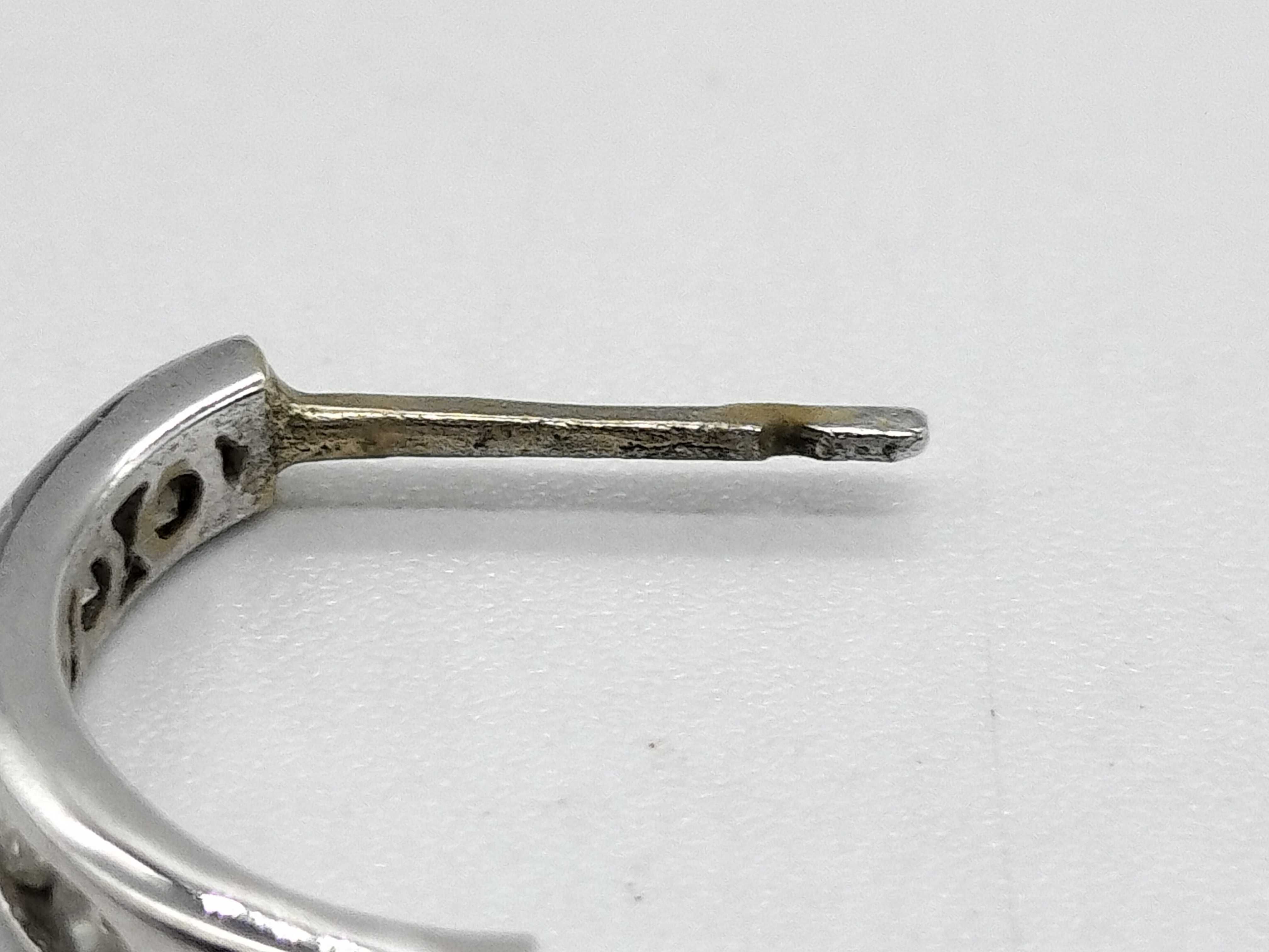 A Pair of 18K White Gold and Diamond Huggie Hoop Earrings