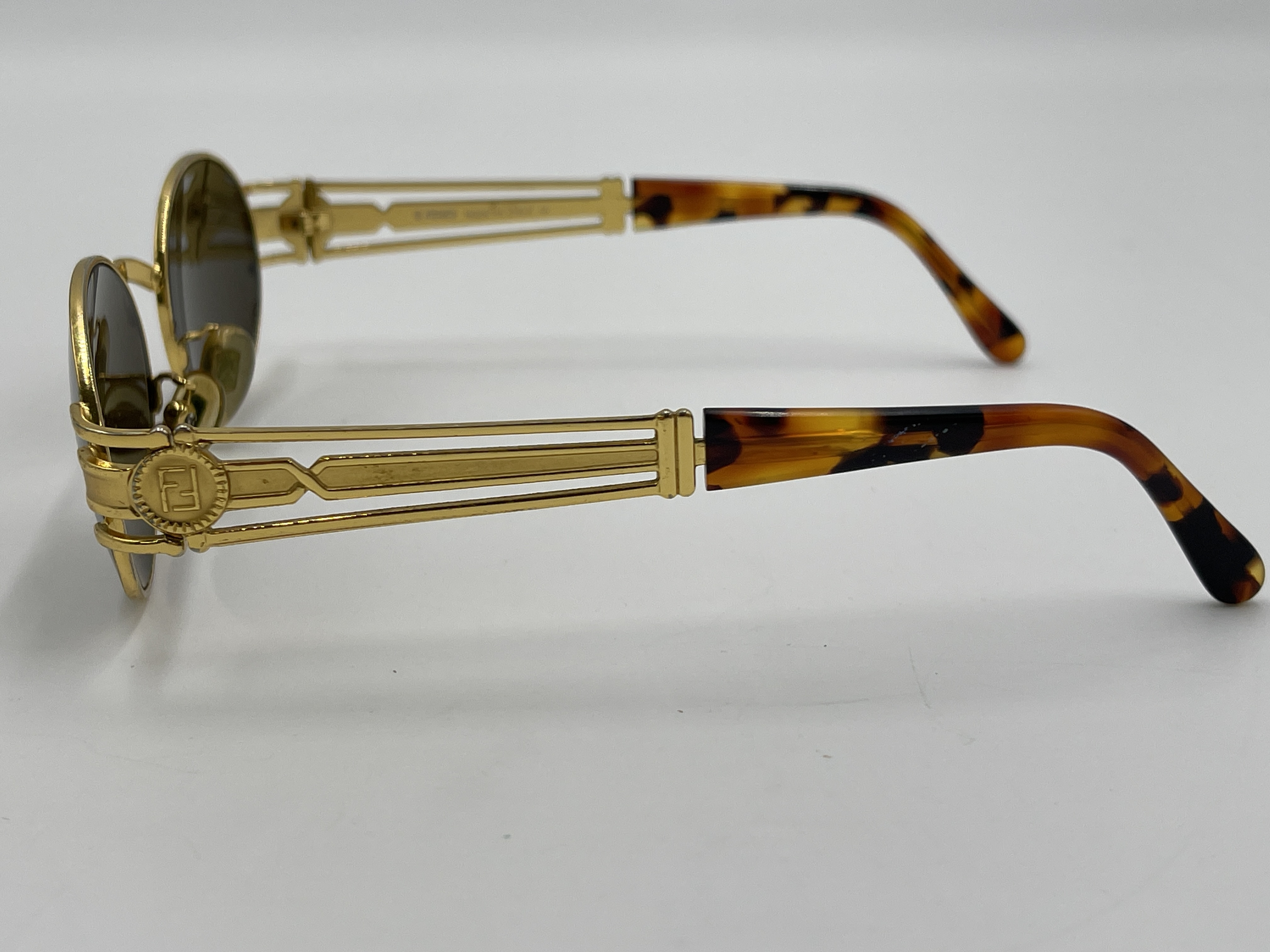 A Pair of Vintage Fendi Gold-Tone Oval Sunglasses, Model SL 7031