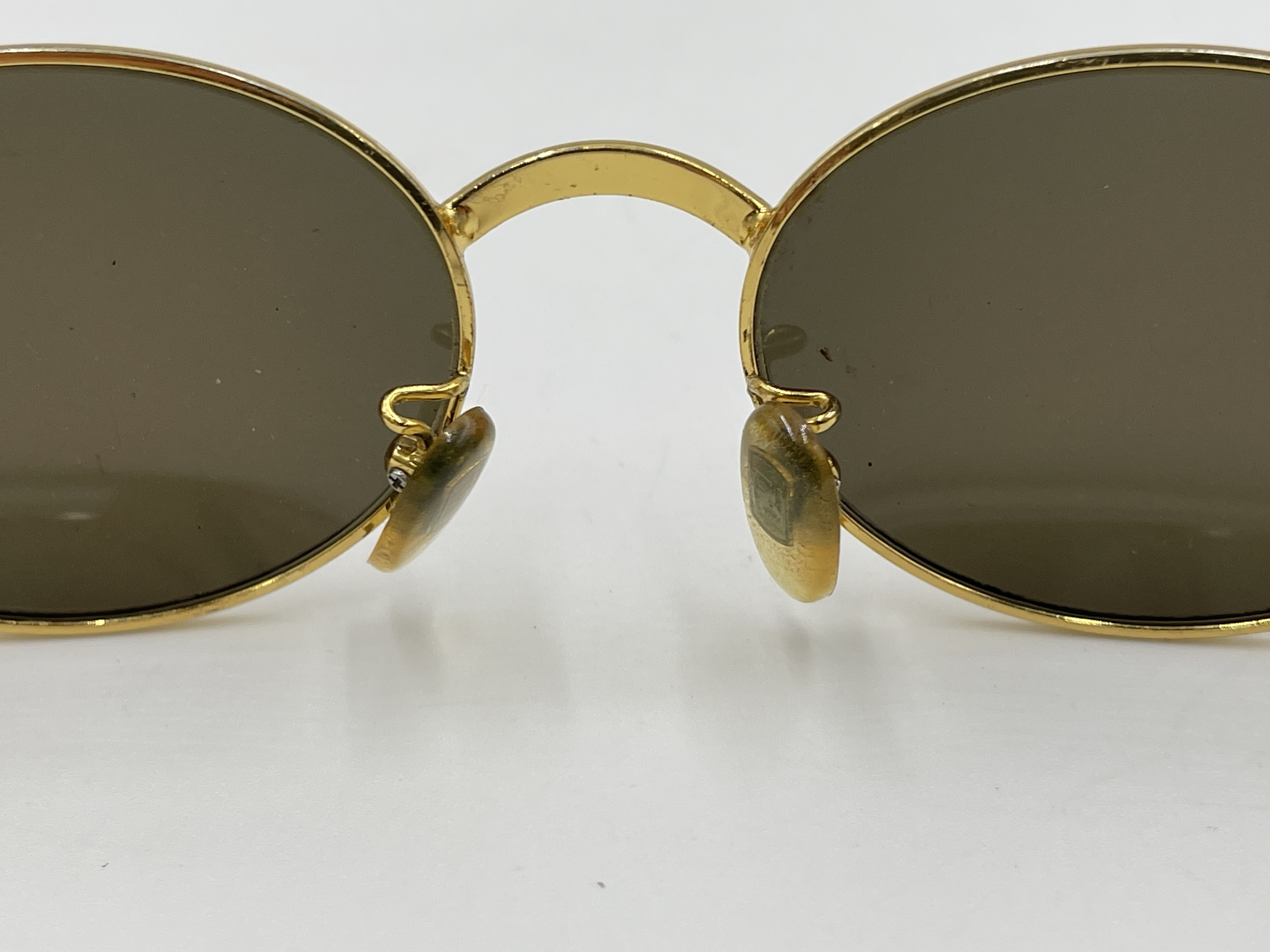 A Pair of Vintage Fendi Gold-Tone Oval Sunglasses, Model SL 7031