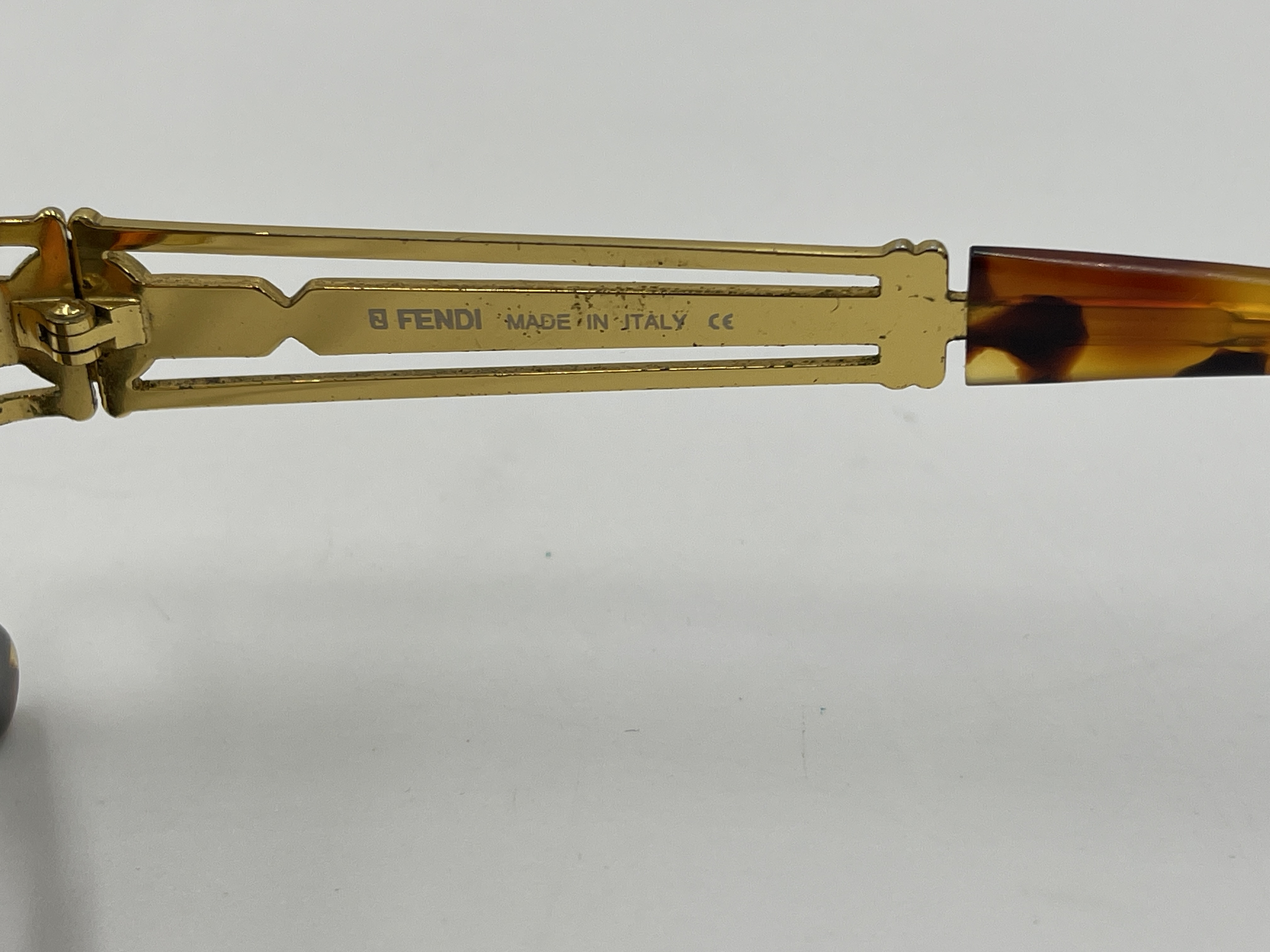 A Pair of Vintage Fendi Gold-Tone Oval Sunglasses, Model SL 7031