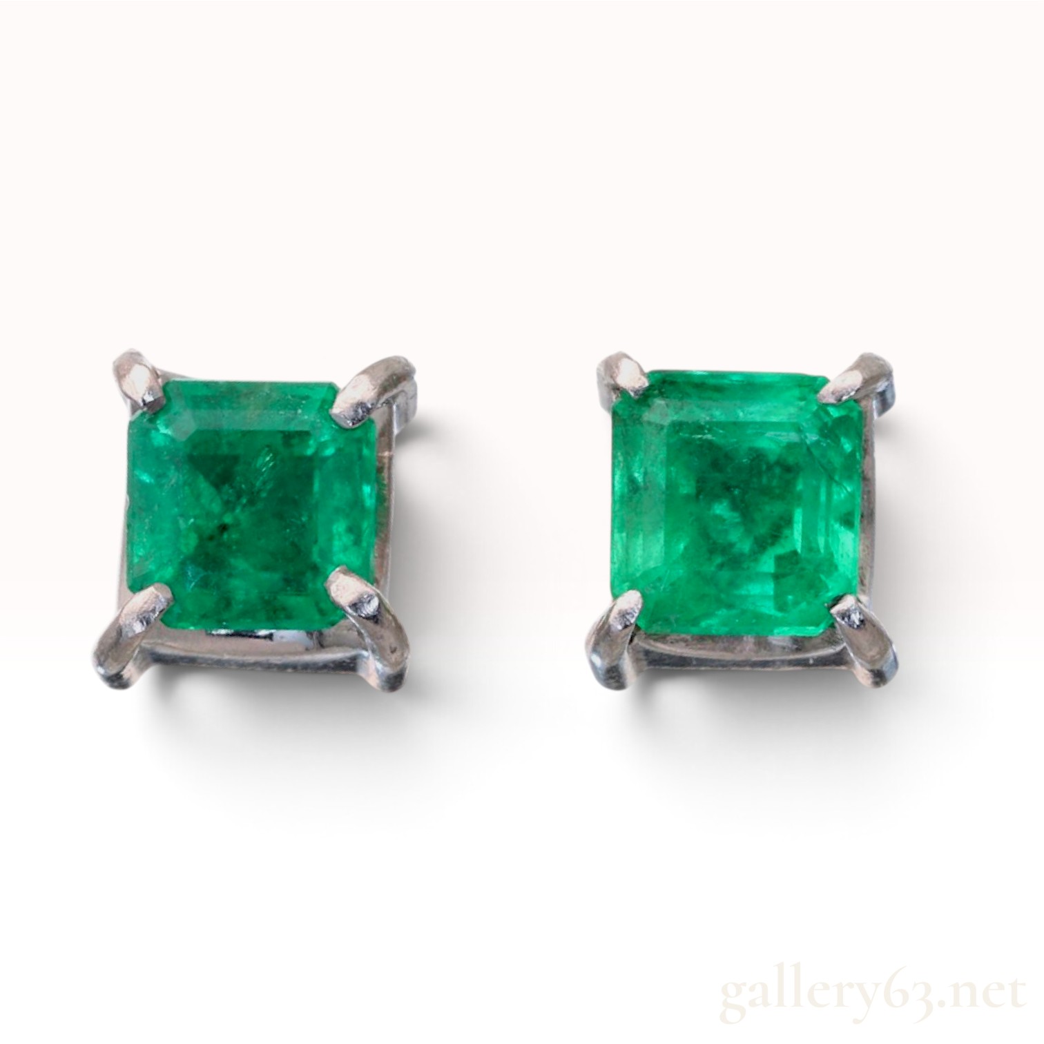 A Pair of Platinum and 0.40ctw Natural Emerald Stud Earrings