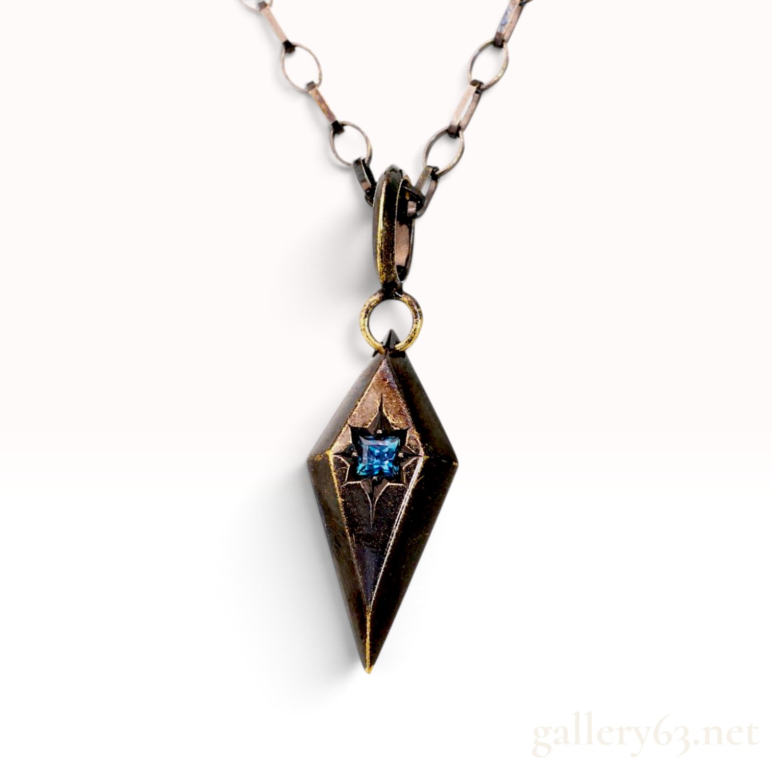 An 18K Gold Color-Change Alexandrite Pendant with 10K Gold Necklace and Memo