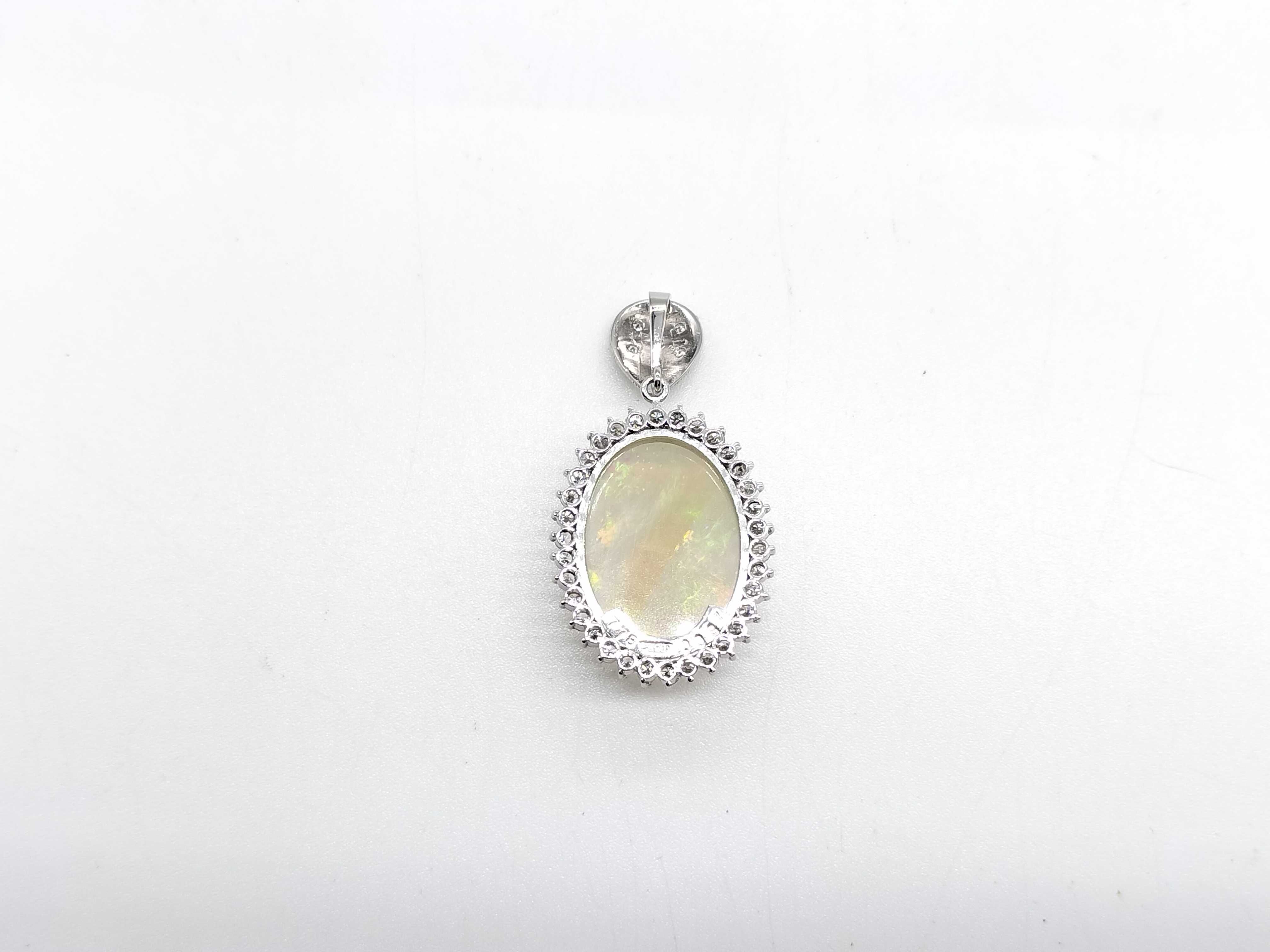 Pt900 7.78ct Natural Opal and 0.87ctw Natural Diamond Halo Pendant W/GRJ Memo