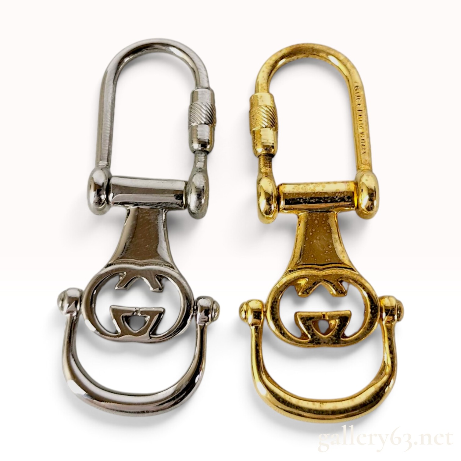 Two Vintage Gucci Interlocking G Metal Keychains with Box