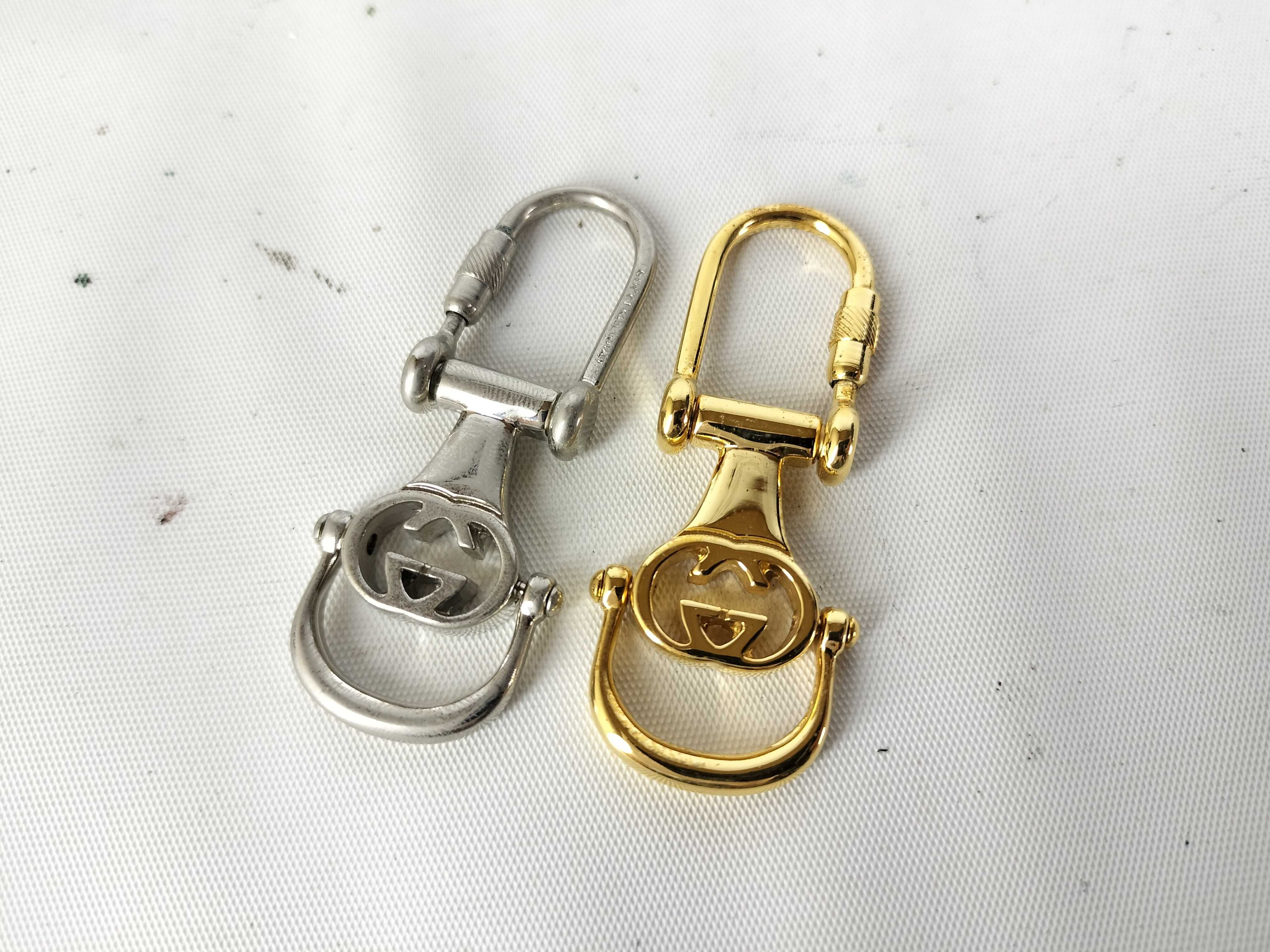 Two Vintage Gucci Interlocking G Metal Keychains with Box