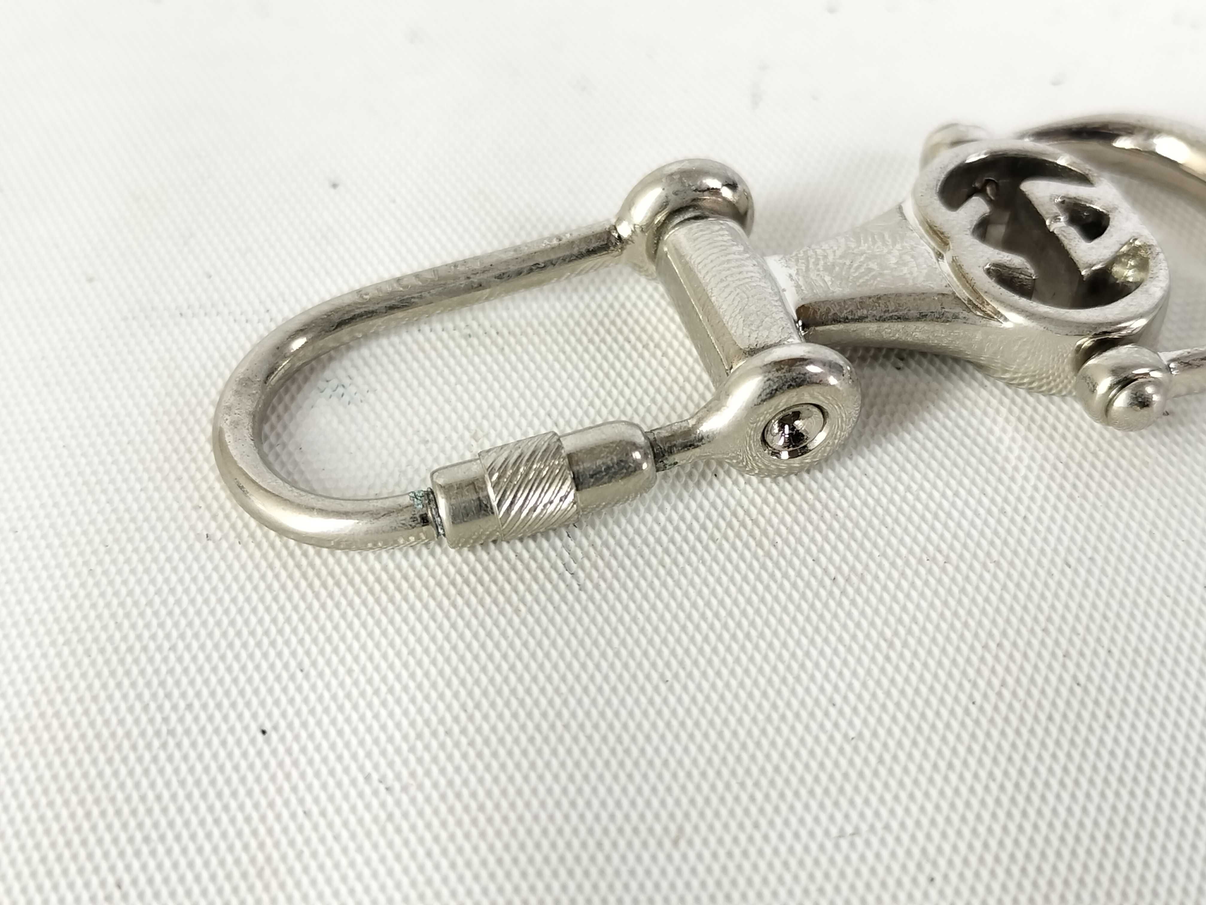 Two Vintage Gucci Interlocking G Metal Keychains with Box