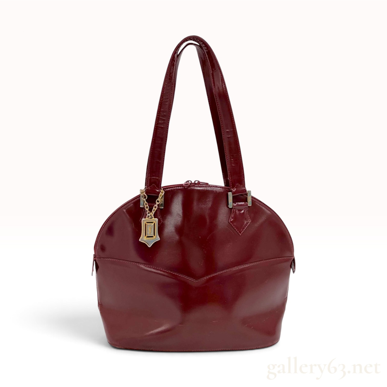 A Vintage Yves Saint Laurent Burgundy Glossy Grain Leather Dome Shoulder Bag