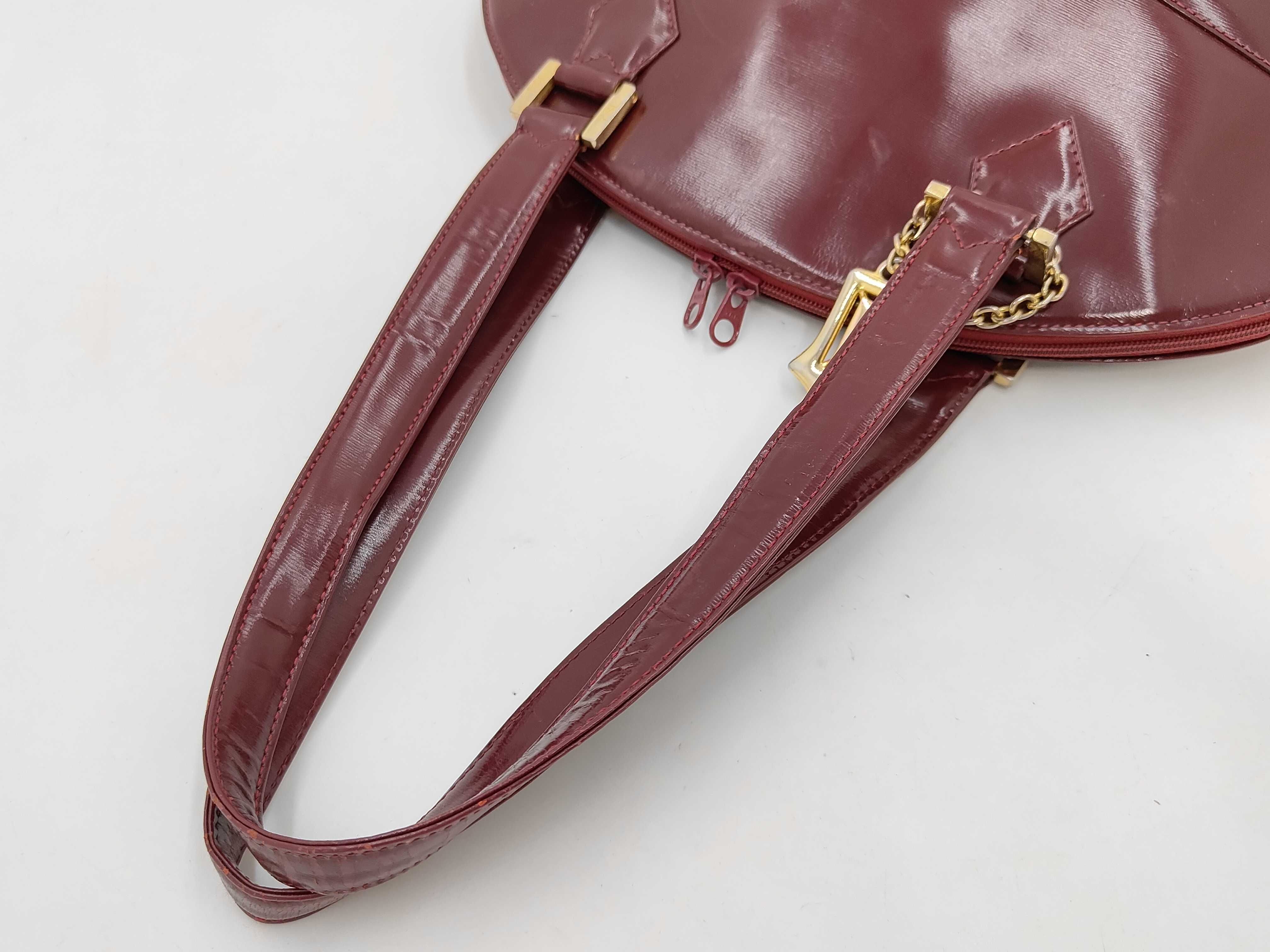 A Vintage Yves Saint Laurent Burgundy Glossy Grain Leather Dome Shoulder Bag